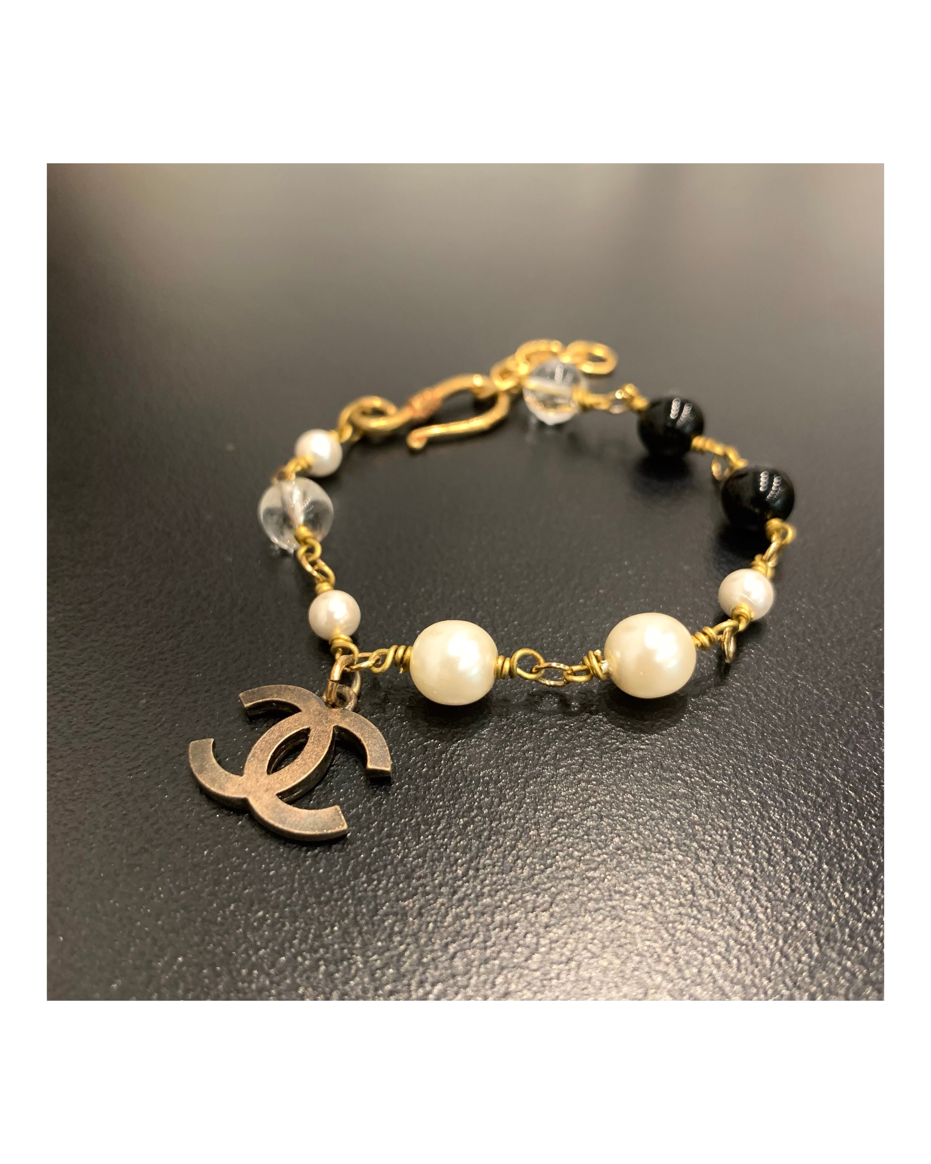 CHANEL bronze CC pearl bracelet