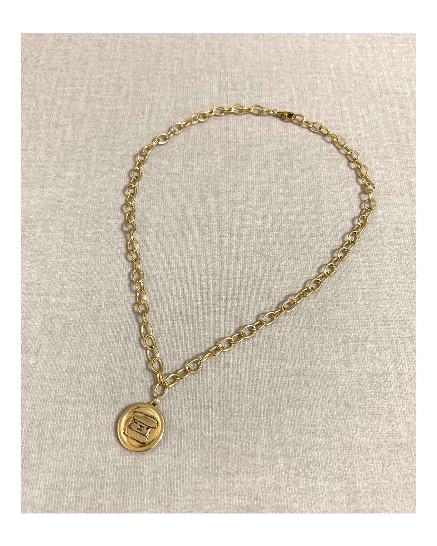 CHANEL button no.64