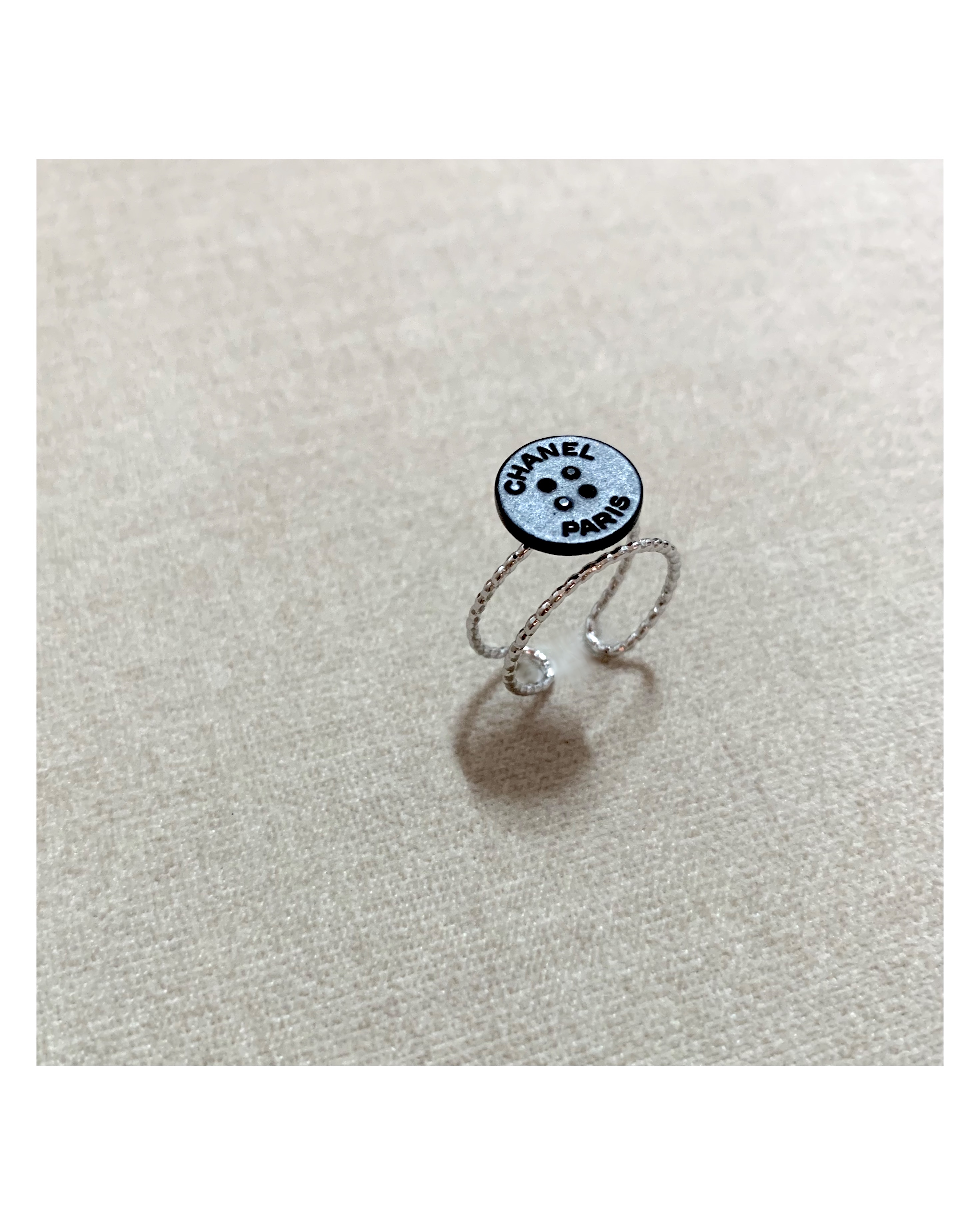 CHANEL button no.68