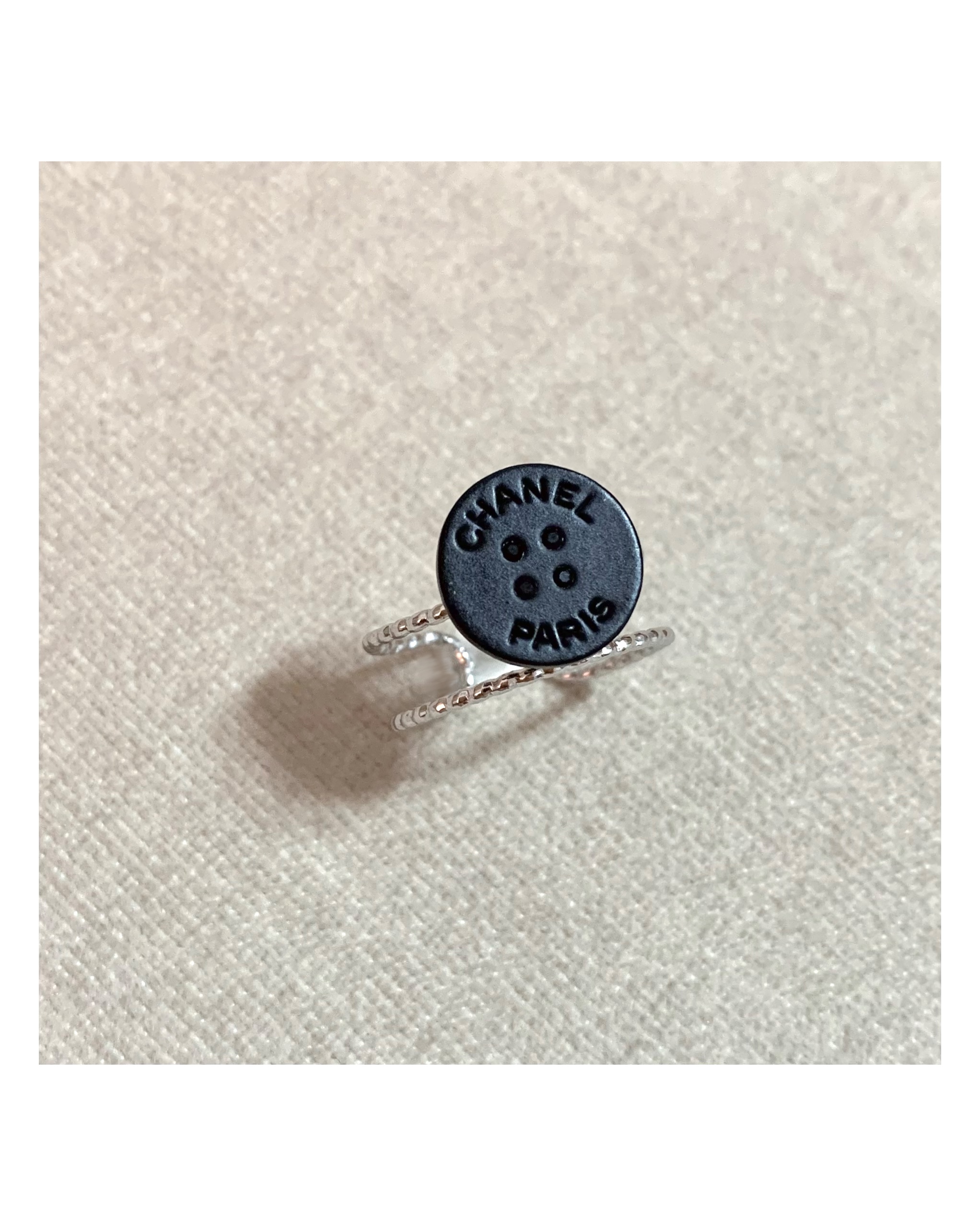 CHANEL button no.68