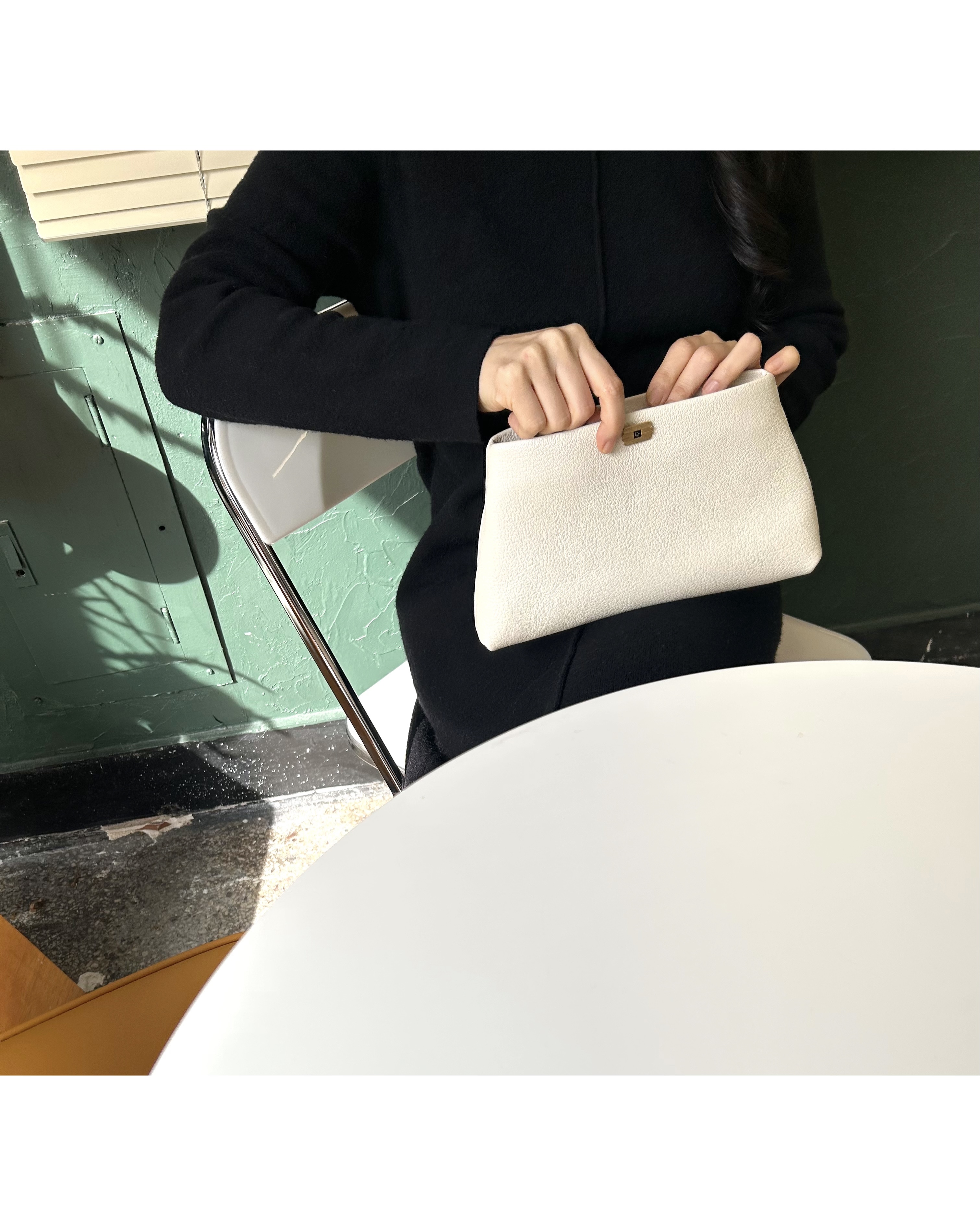 Dior cuff link clutch bag