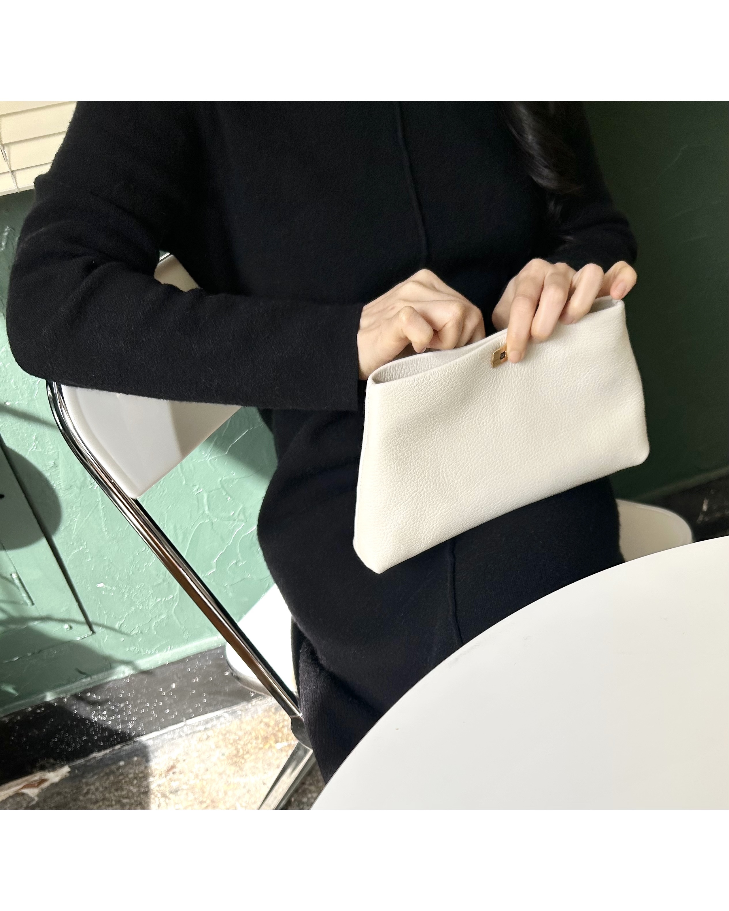 Dior cuff link clutch bag