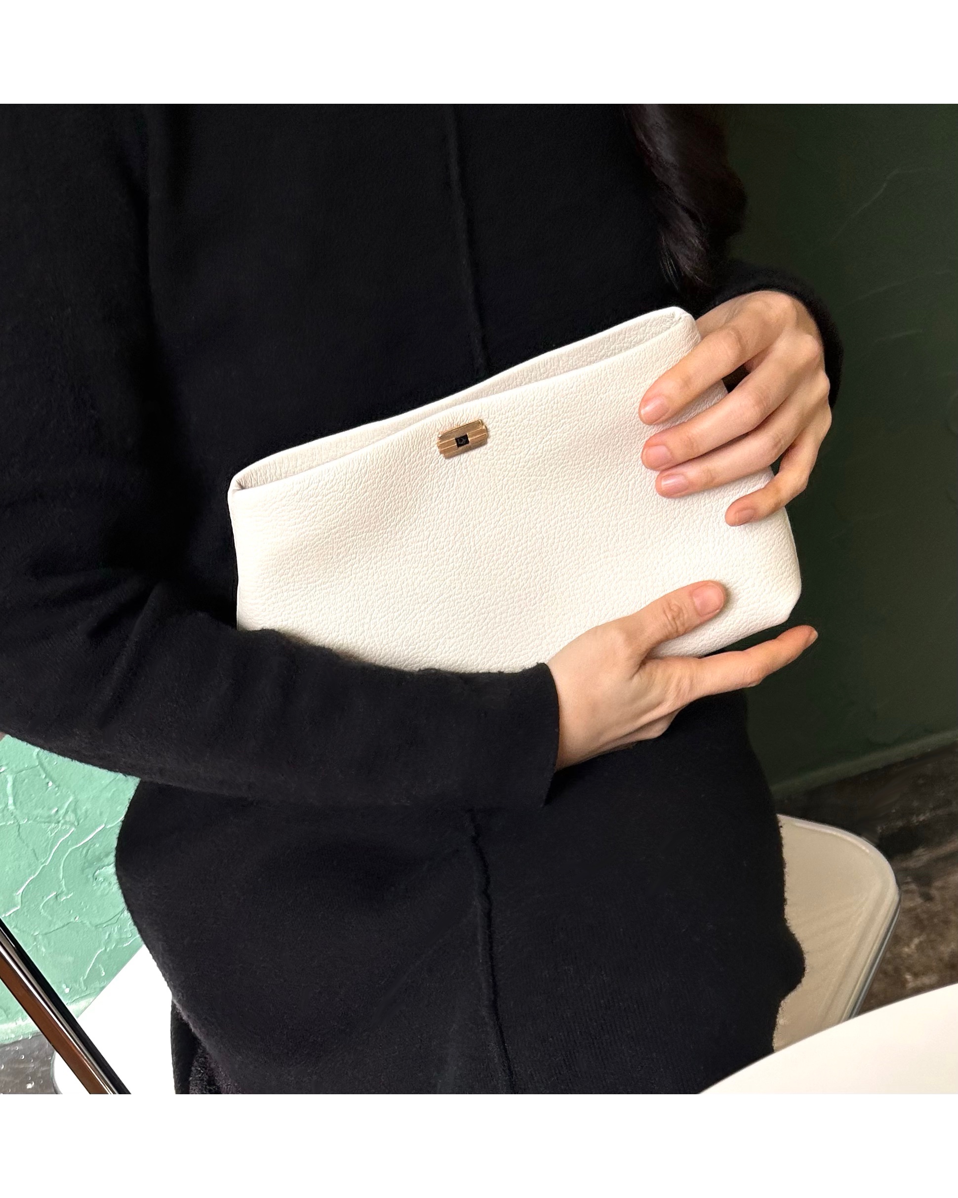 Dior cuff link clutch bag