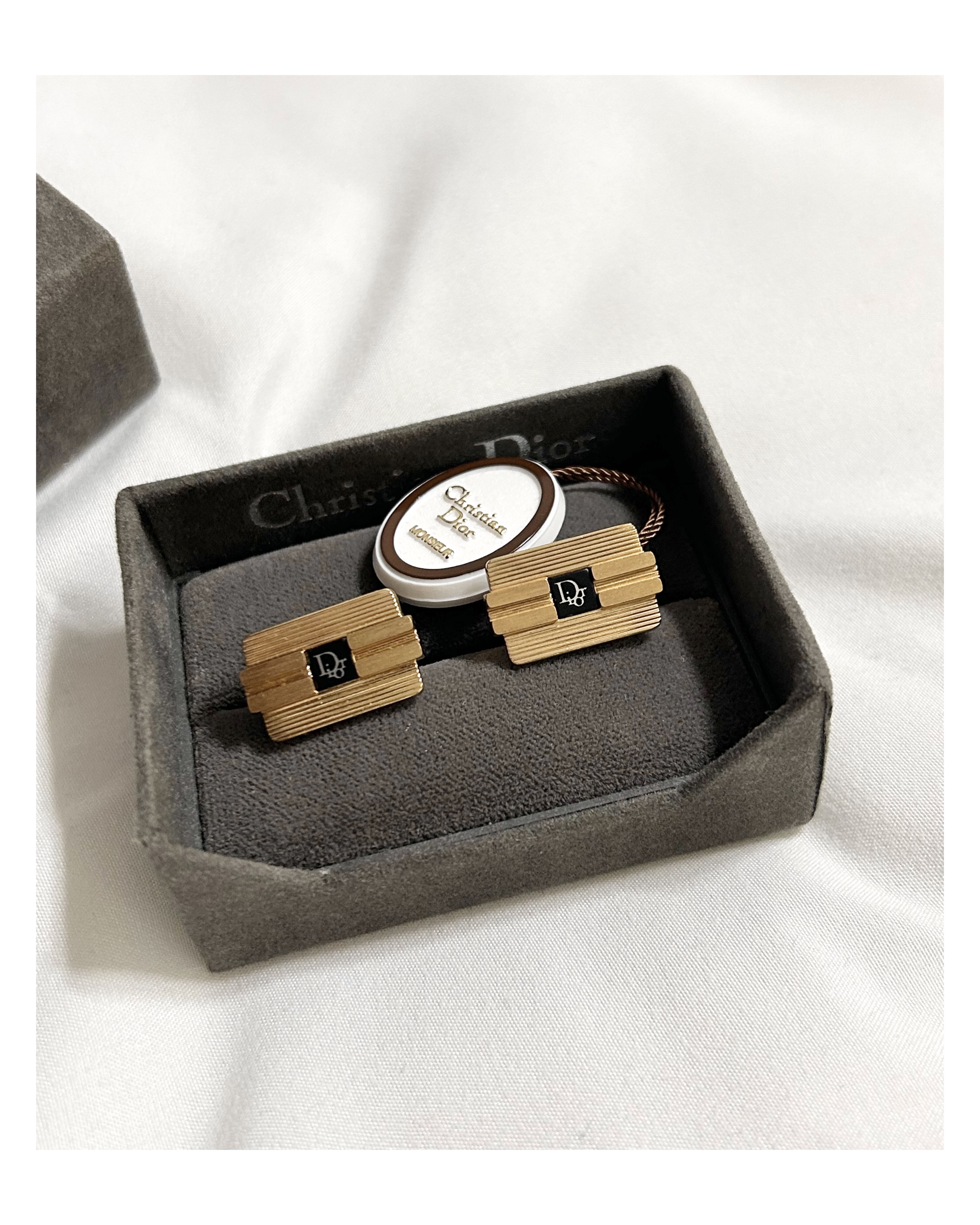 Dior cuff link clutch bag