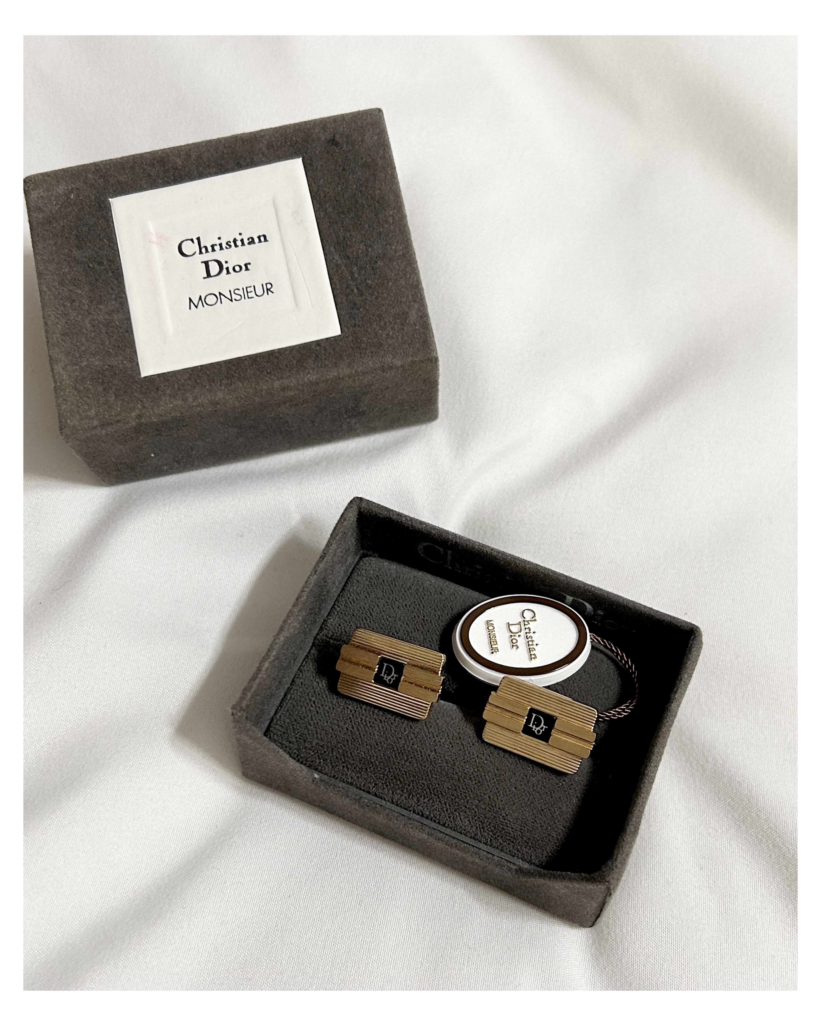 Dior cuff link clutch bag