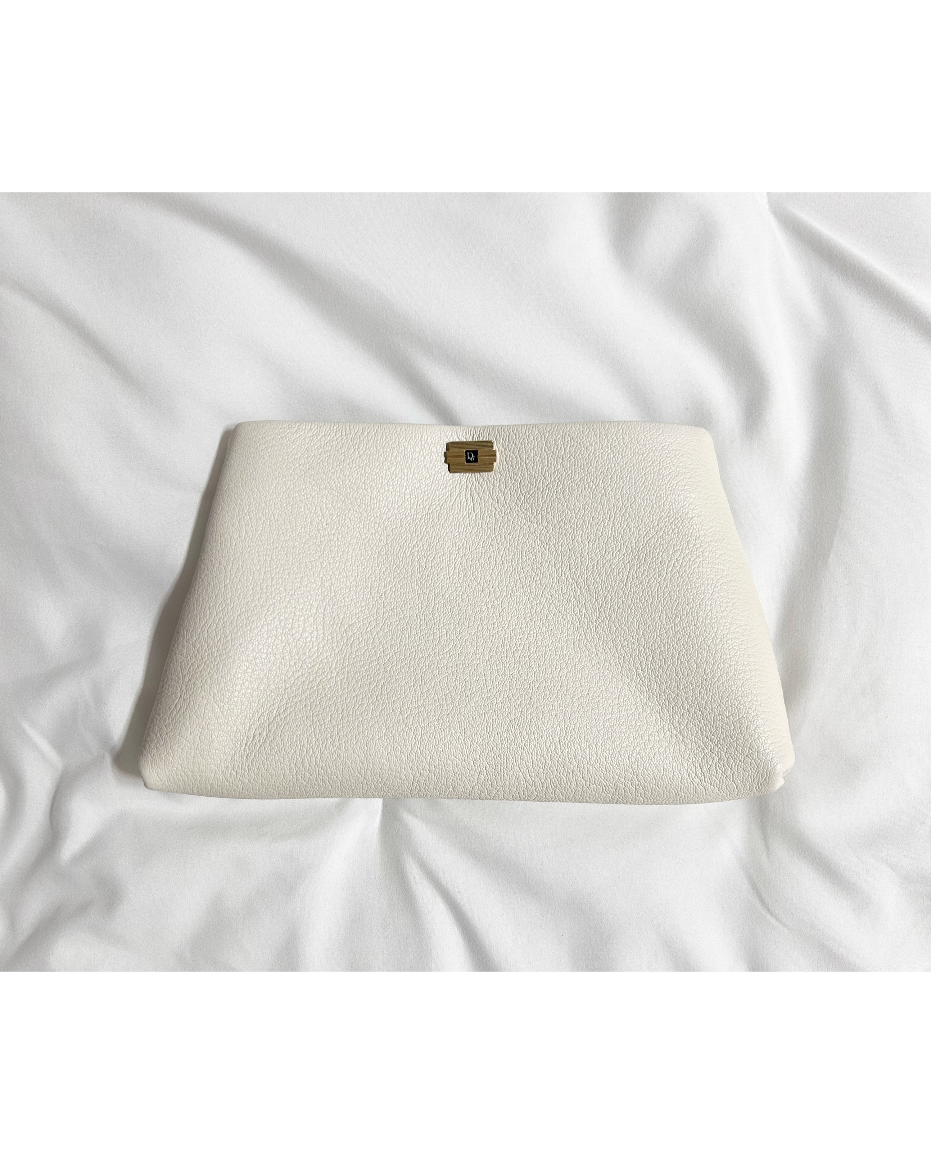 Dior cuff link clutch bag