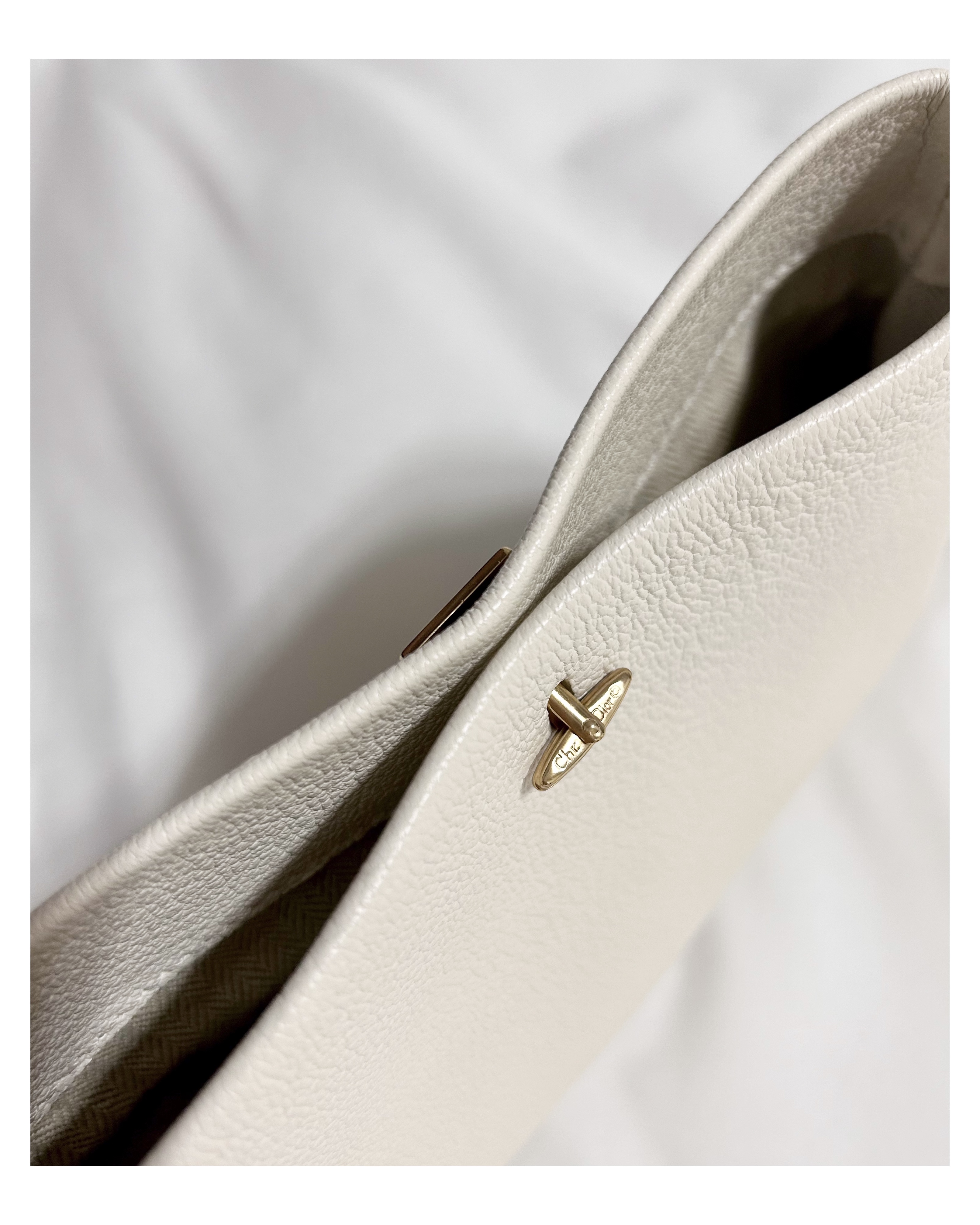 Dior cuff link clutch bag