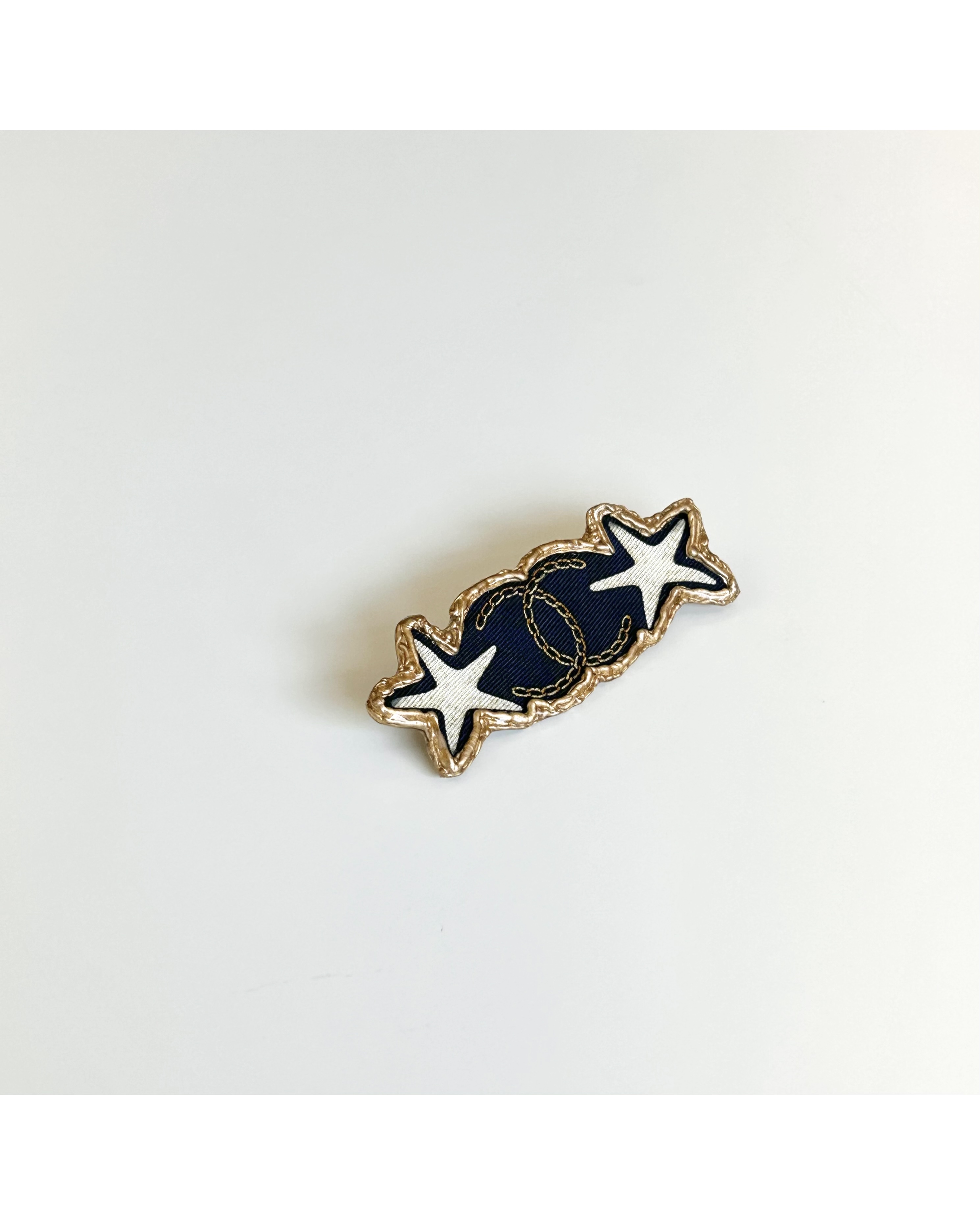 CHANEL silk star CC hair clip no.63