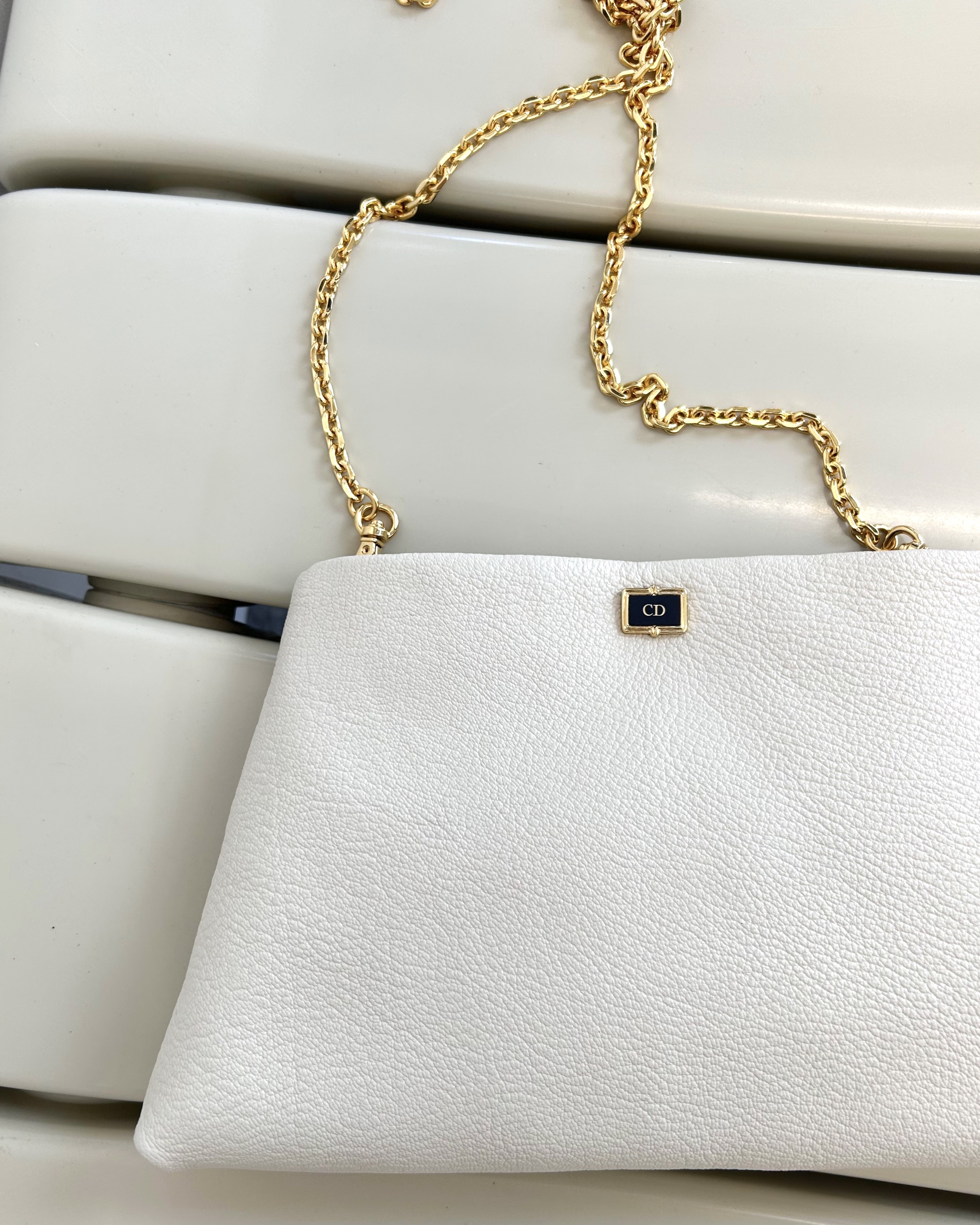 Christian Dior cuff link clutch & chain bag