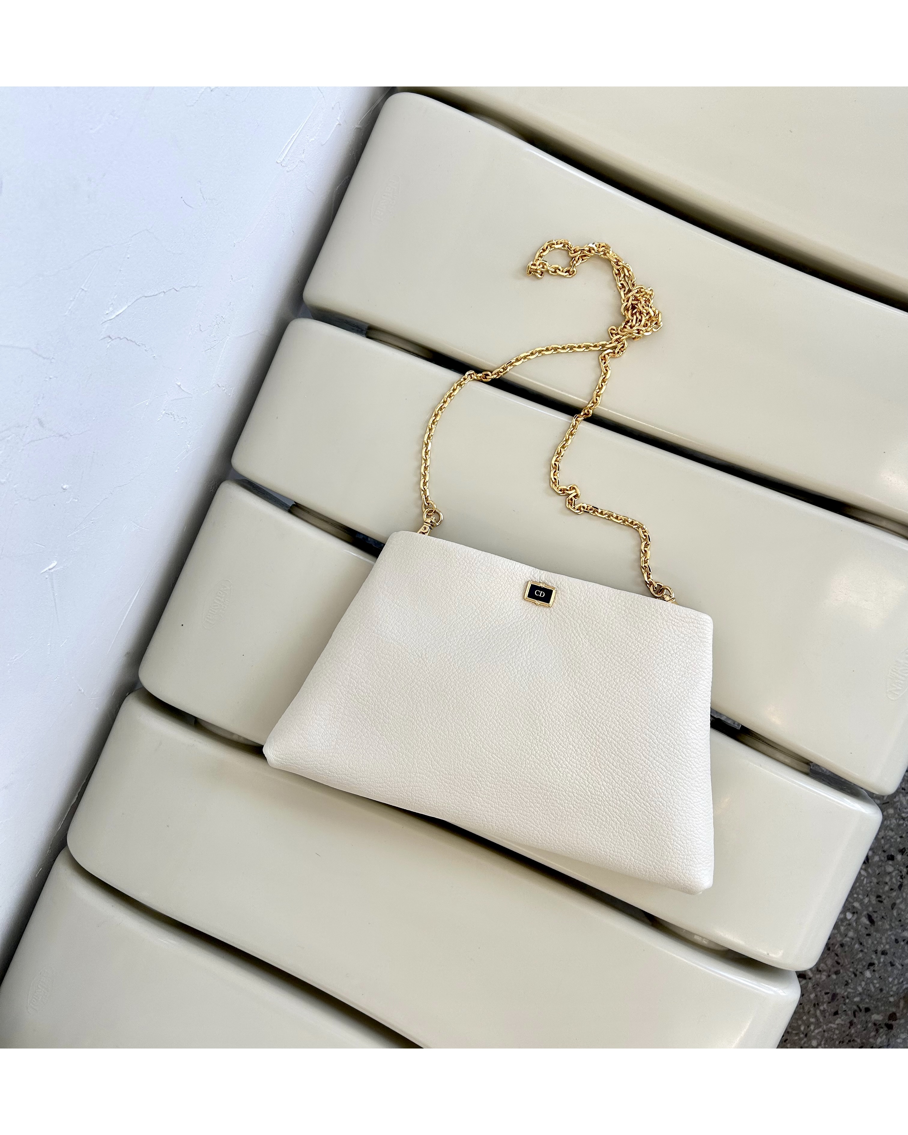 Christian Dior cuff link clutch & chain bag