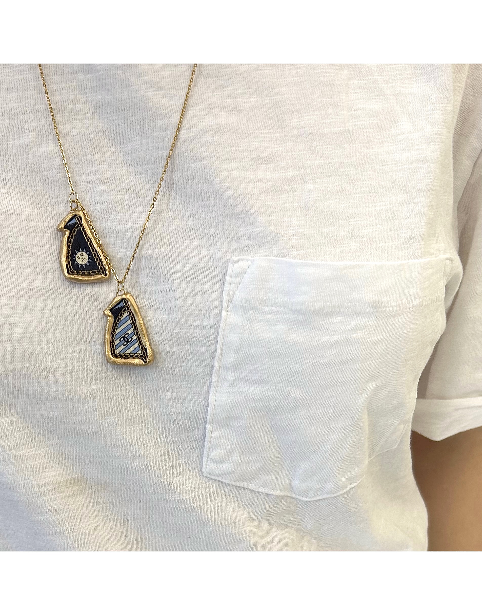 CHANEL blue stripe sail pendant necklace no.50
