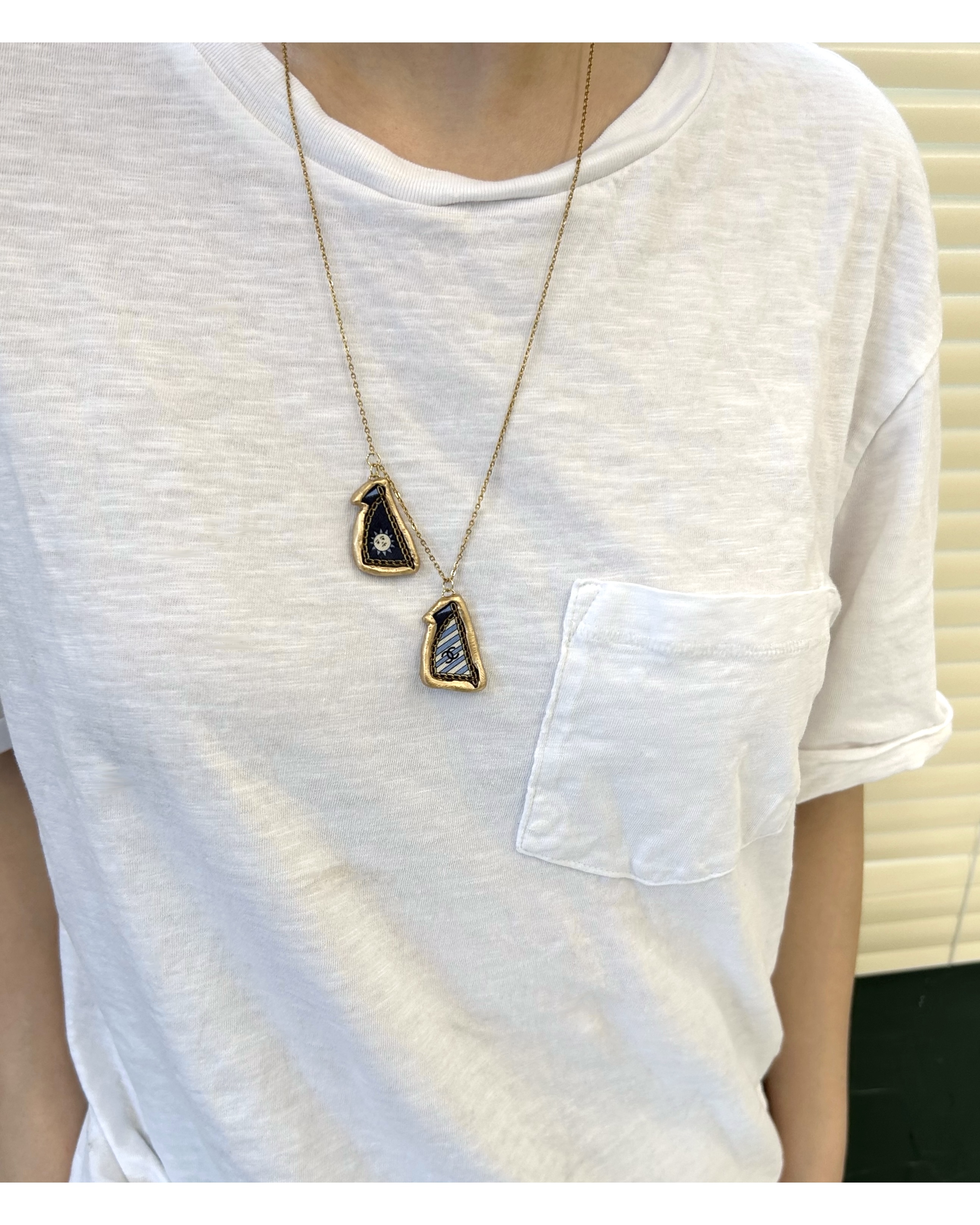 CHANEL blue stripe sail pendant necklace no.50