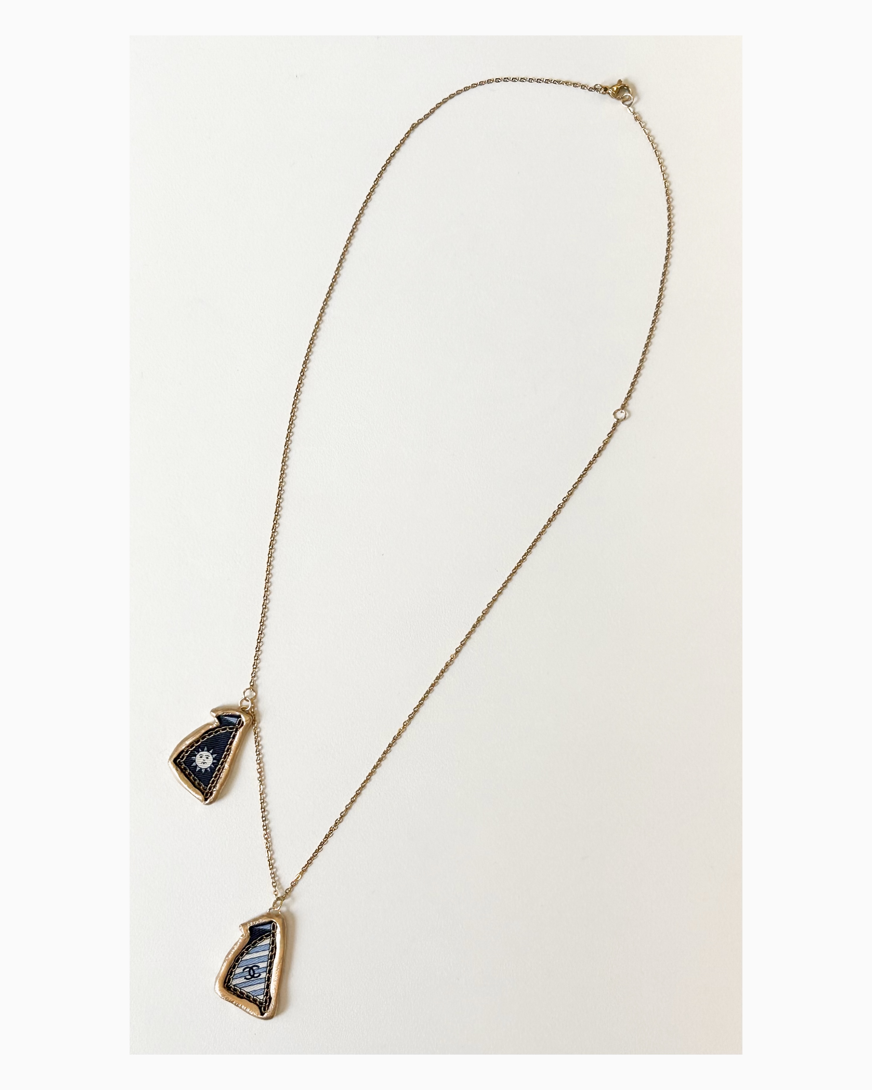 CHANEL blue stripe sail pendant necklace no.50