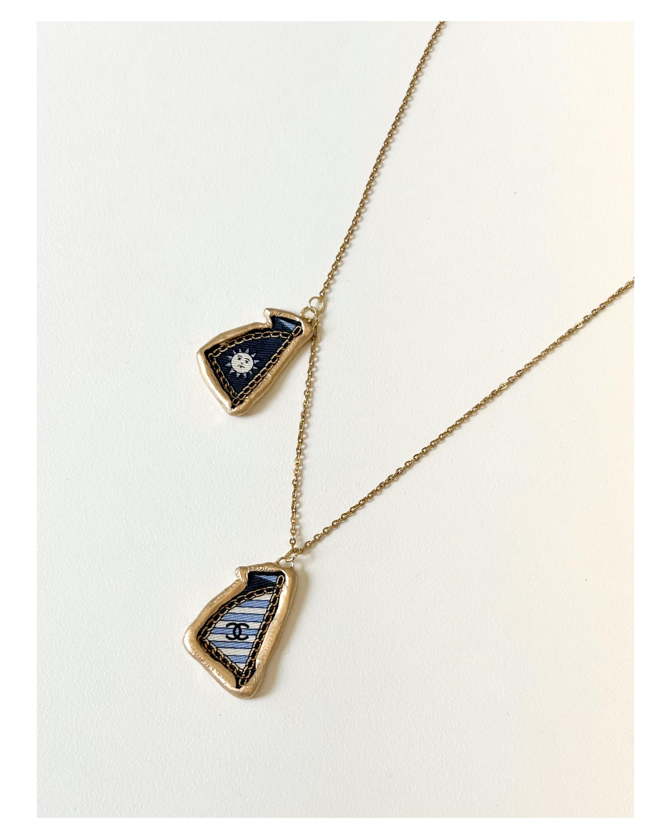 CHANEL blue stripe sail pendant necklace no.50
