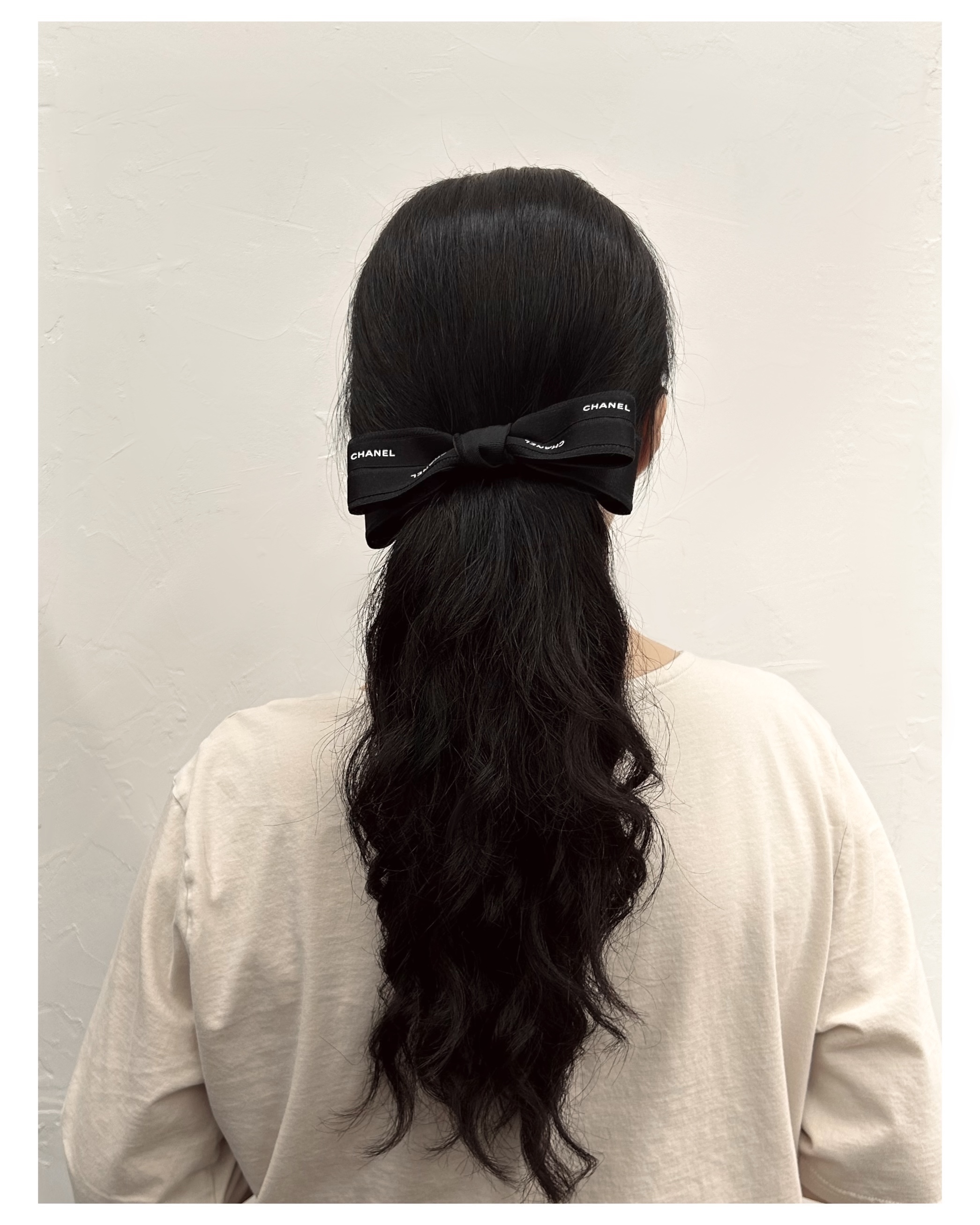 CHANEL initial black ribbon hair clip no.66