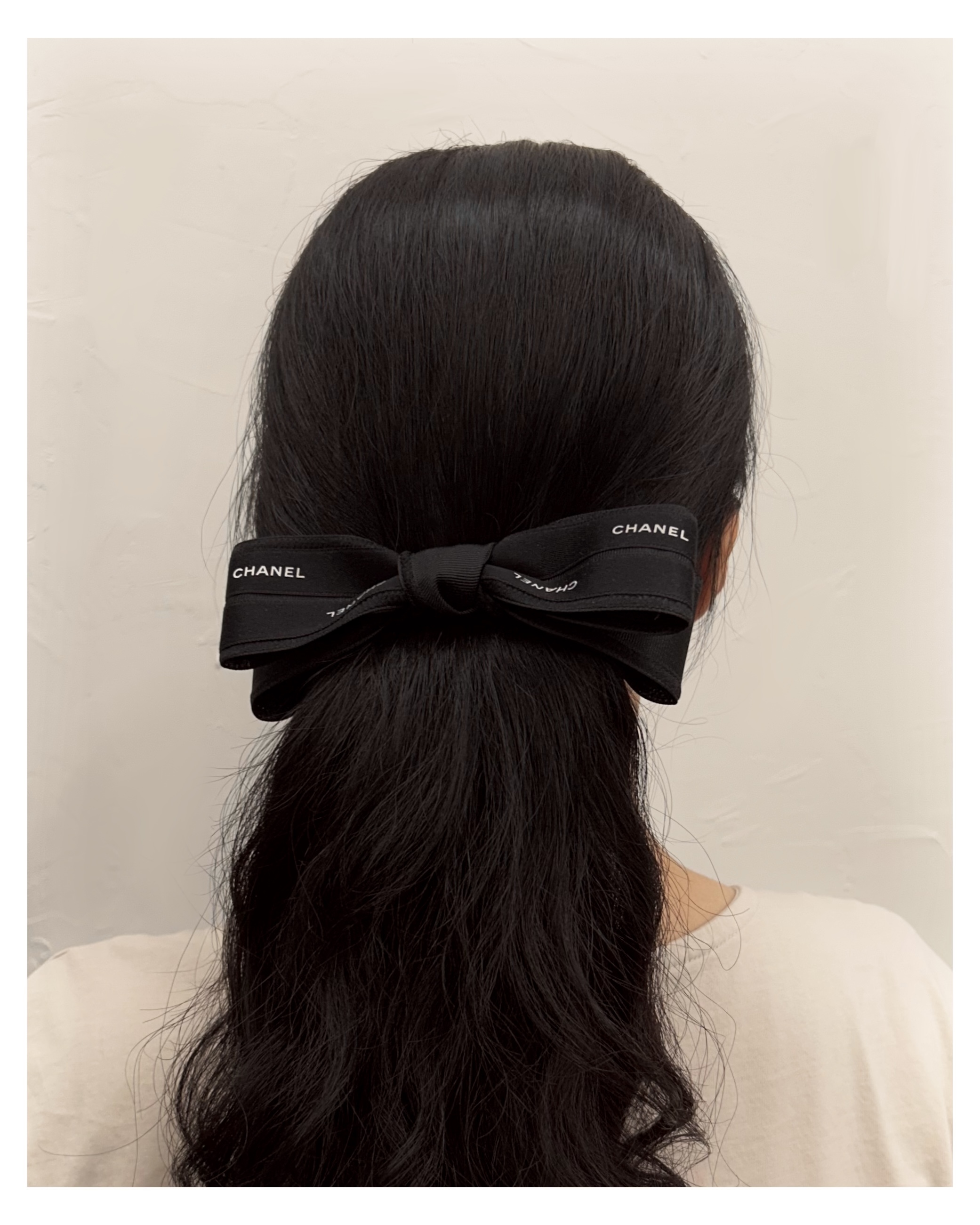 CHANEL initial black ribbon hair clip no.66