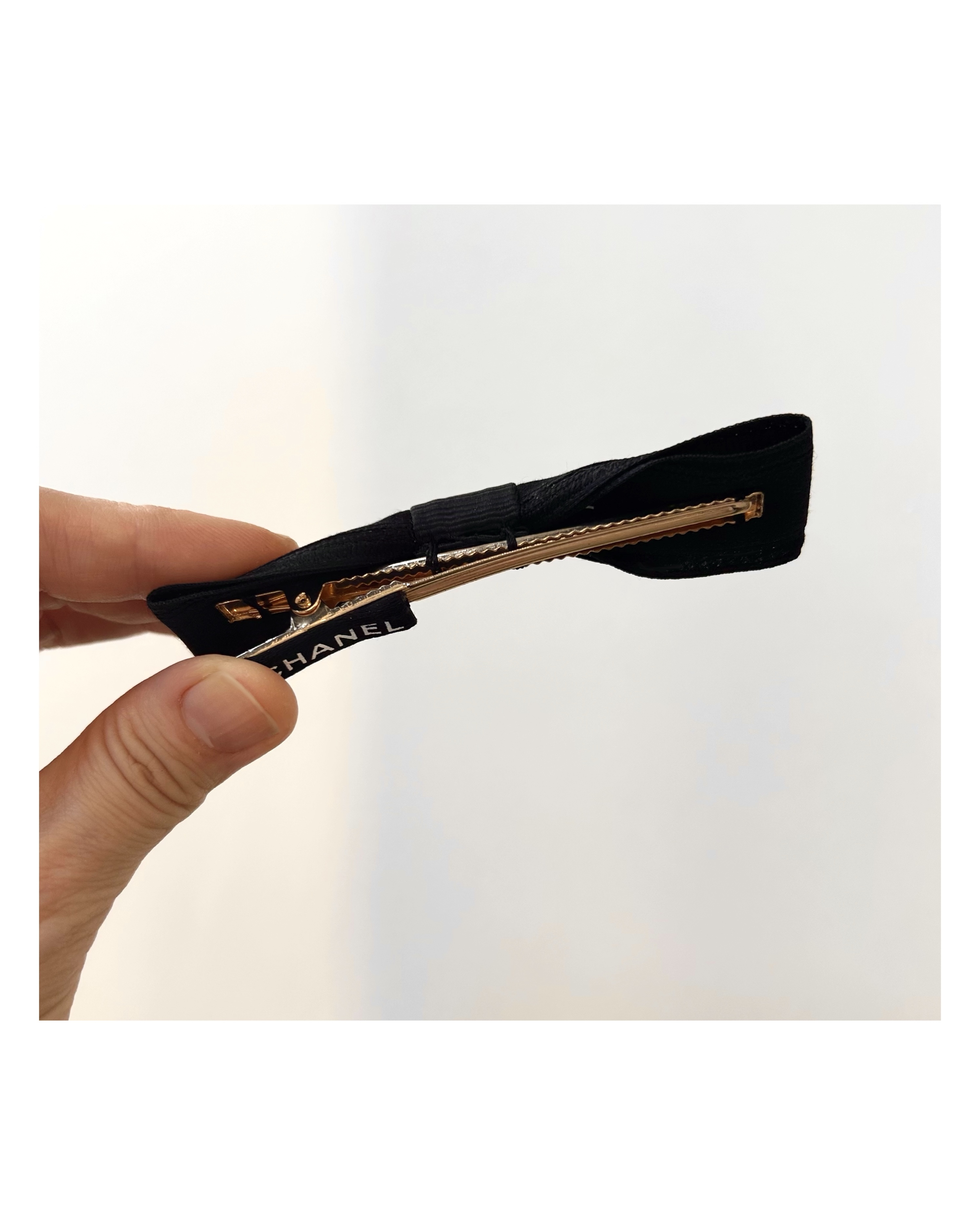 CHANEL initial black ribbon hair clip no.67