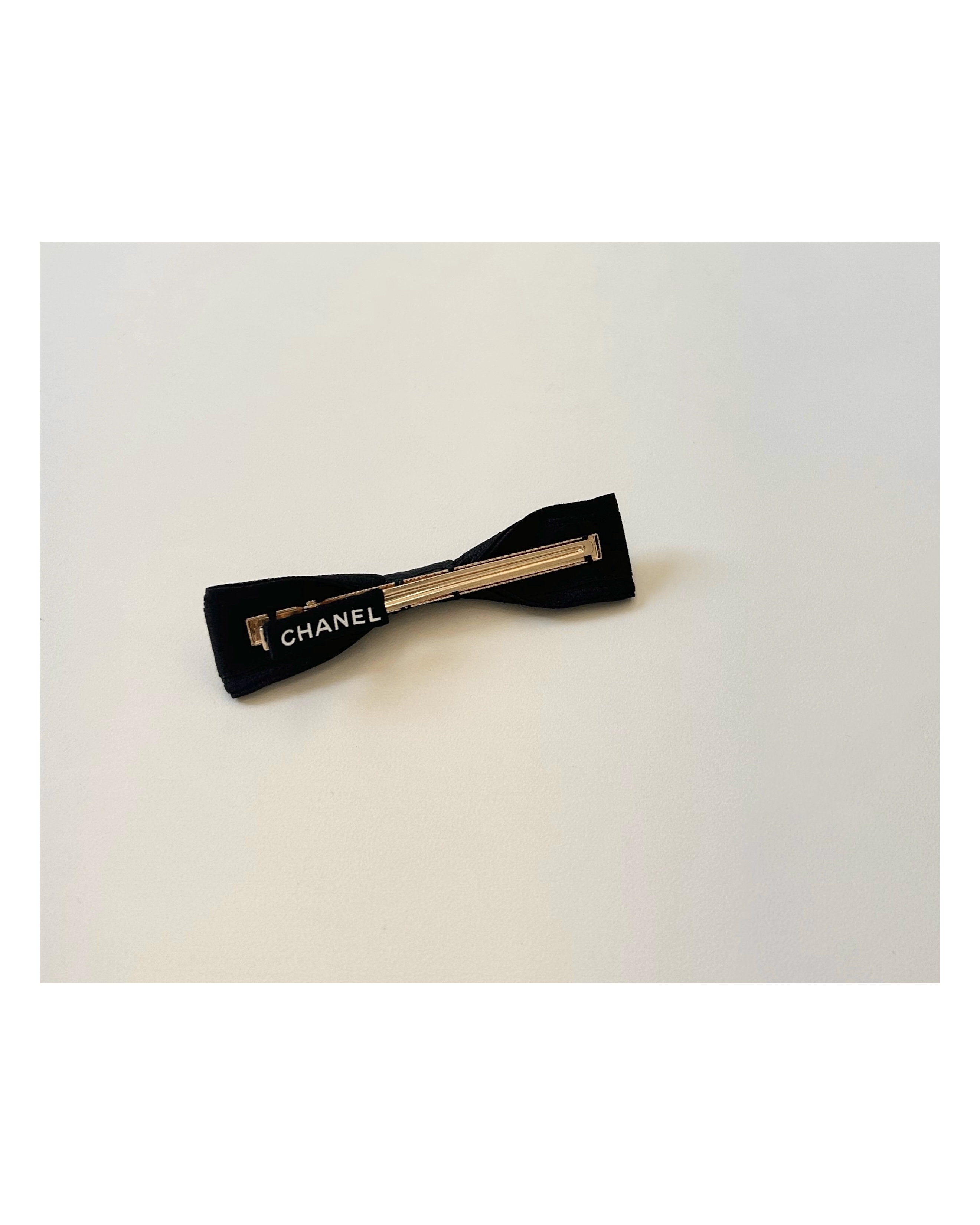 CHANEL initial black ribbon hair clip no.67