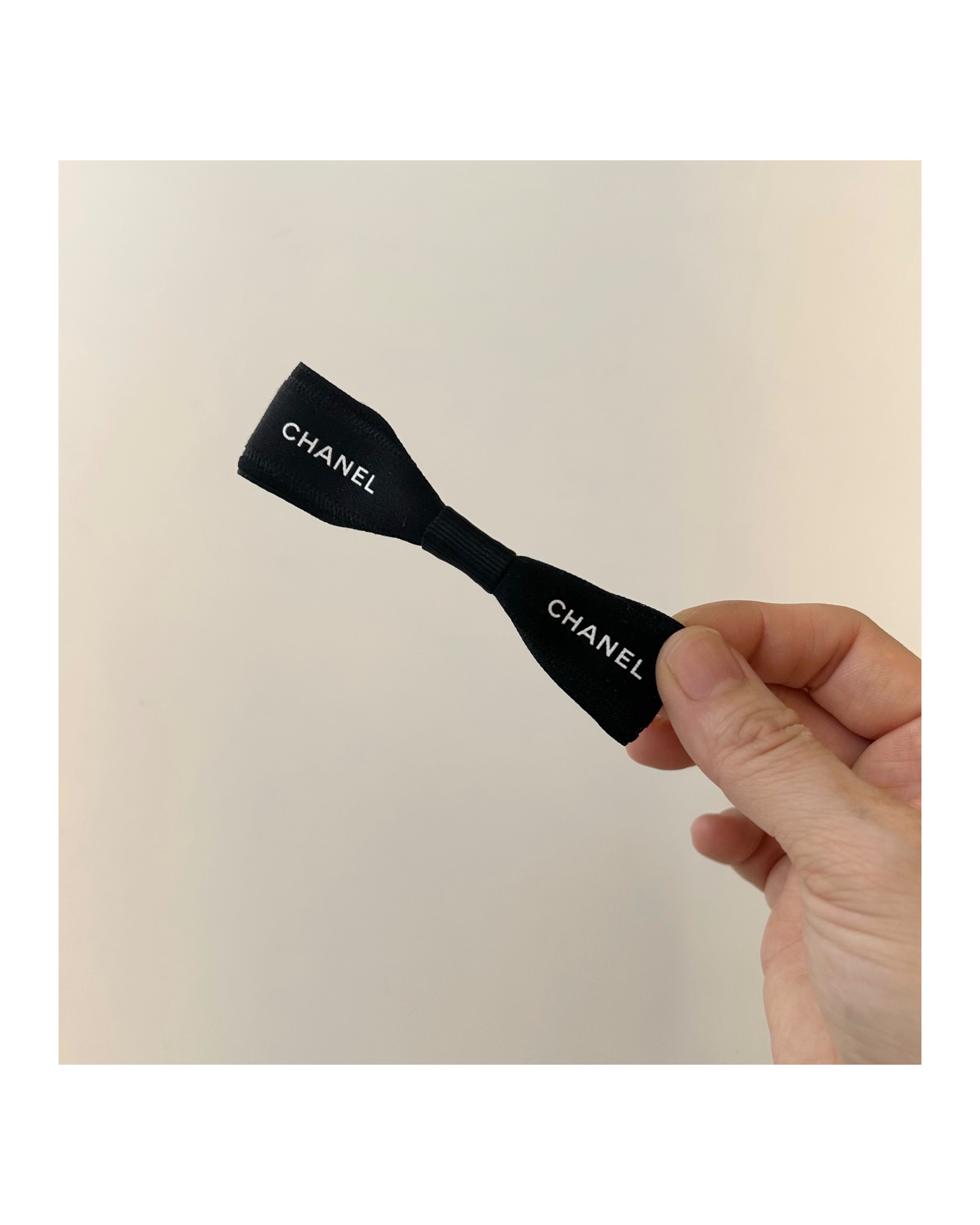 CHANEL initial black ribbon hair clip no.67