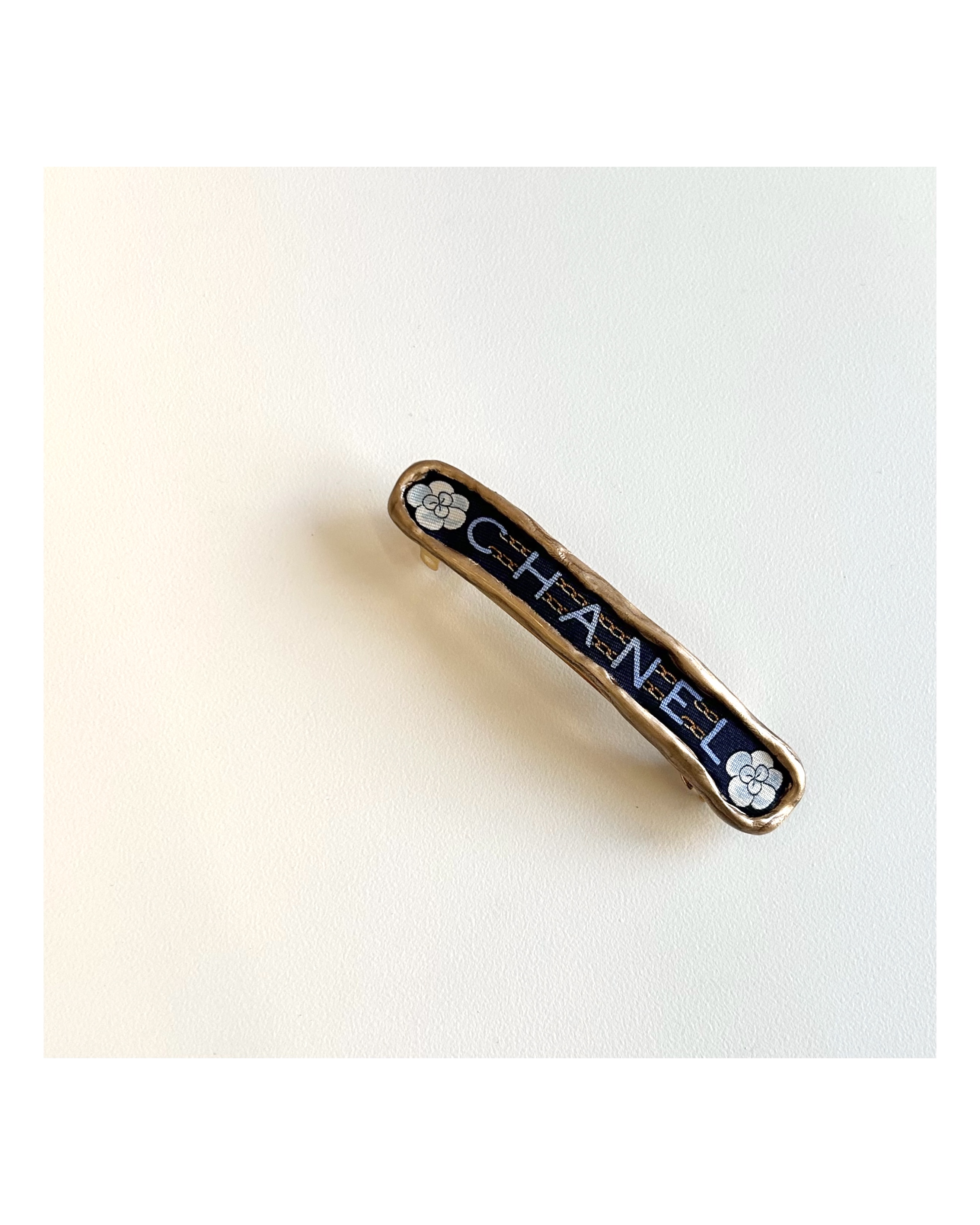 CHANEL camellia initial hair clip no.69