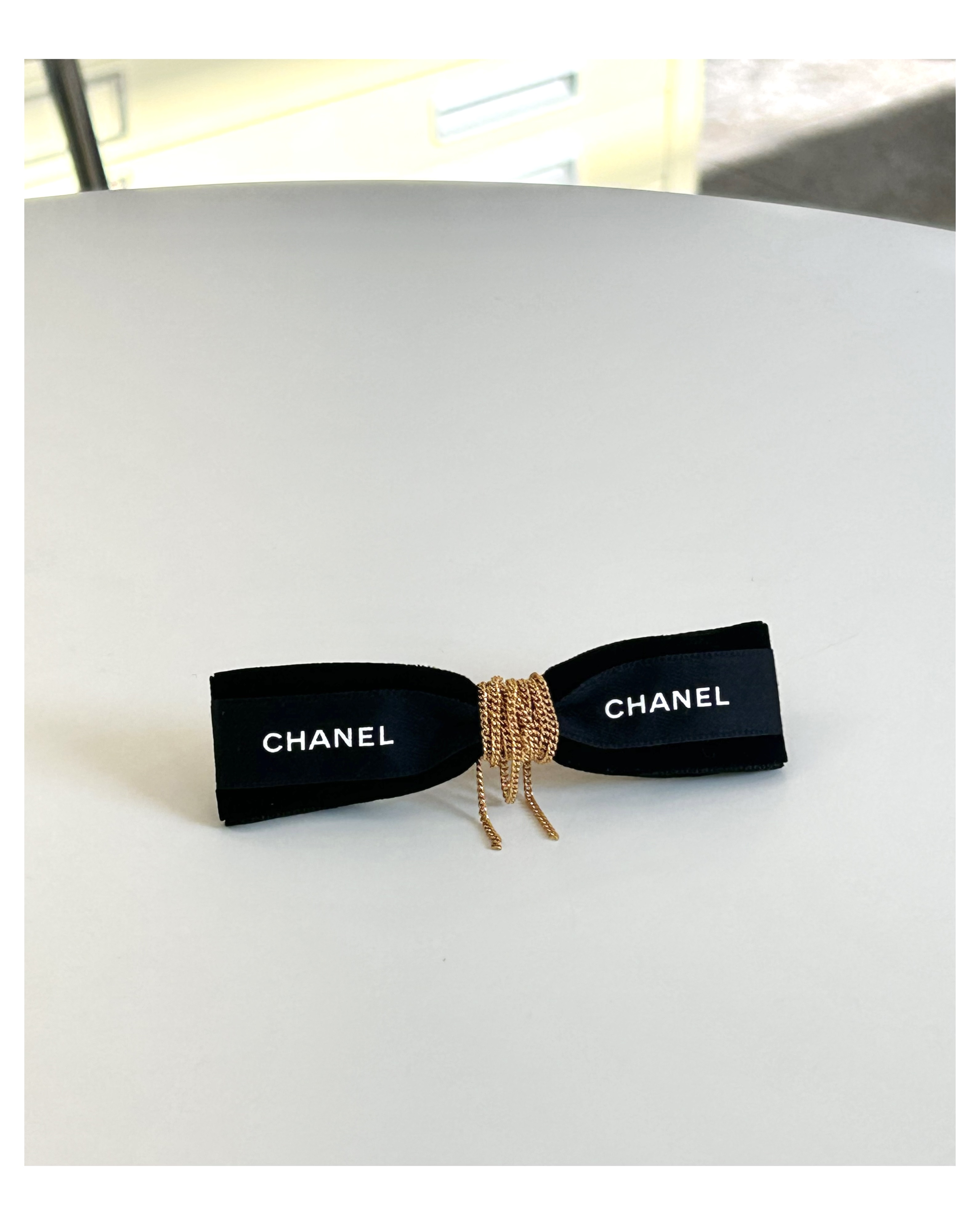CHANEL velvet initial ribbon hair clip no.70