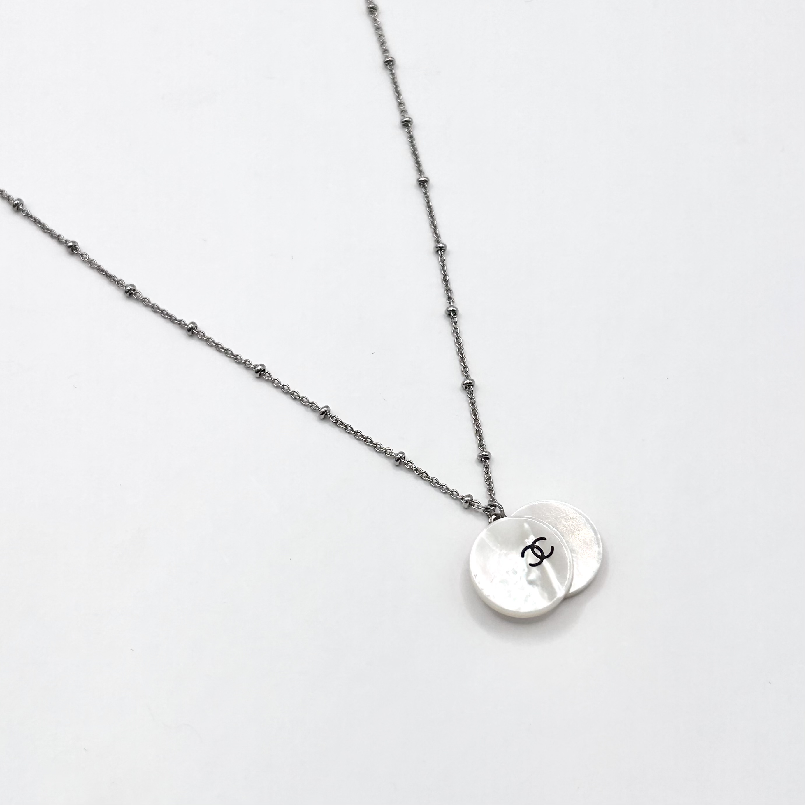 CHANEL button no.111