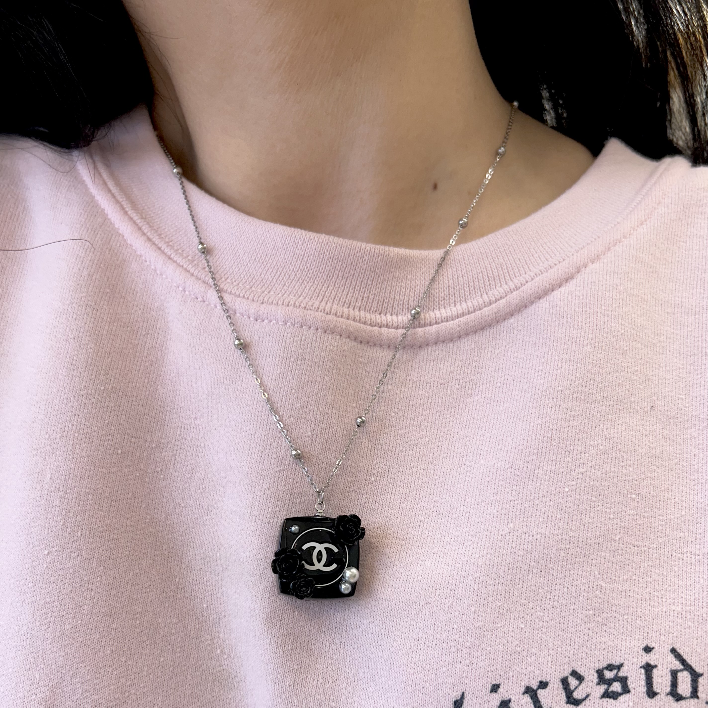 CHANEL camellia cosmetic pendant necklace