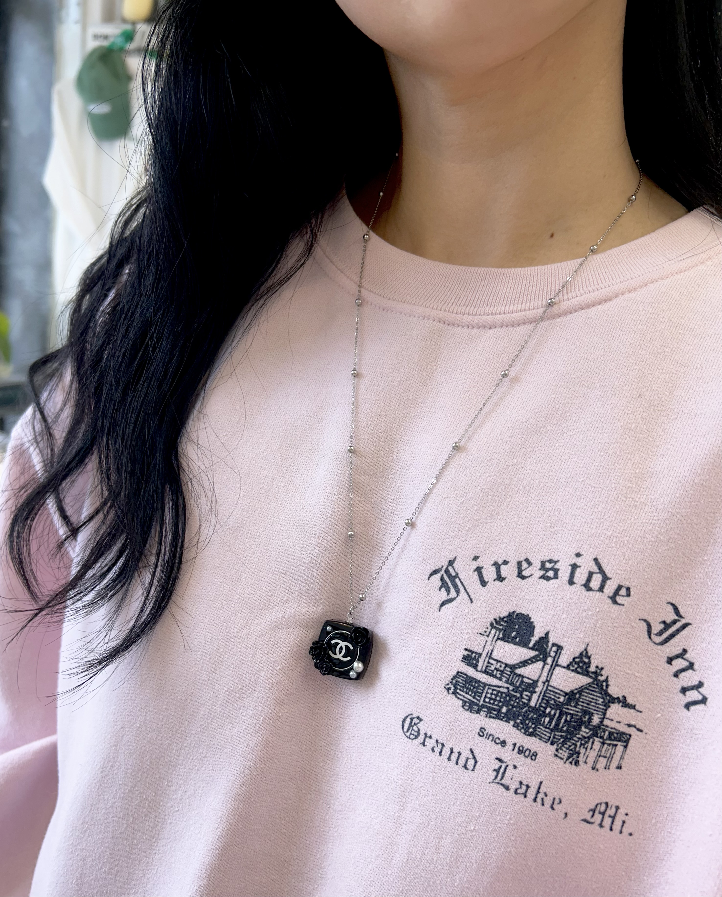 CHANEL camellia cosmetic pendant necklace