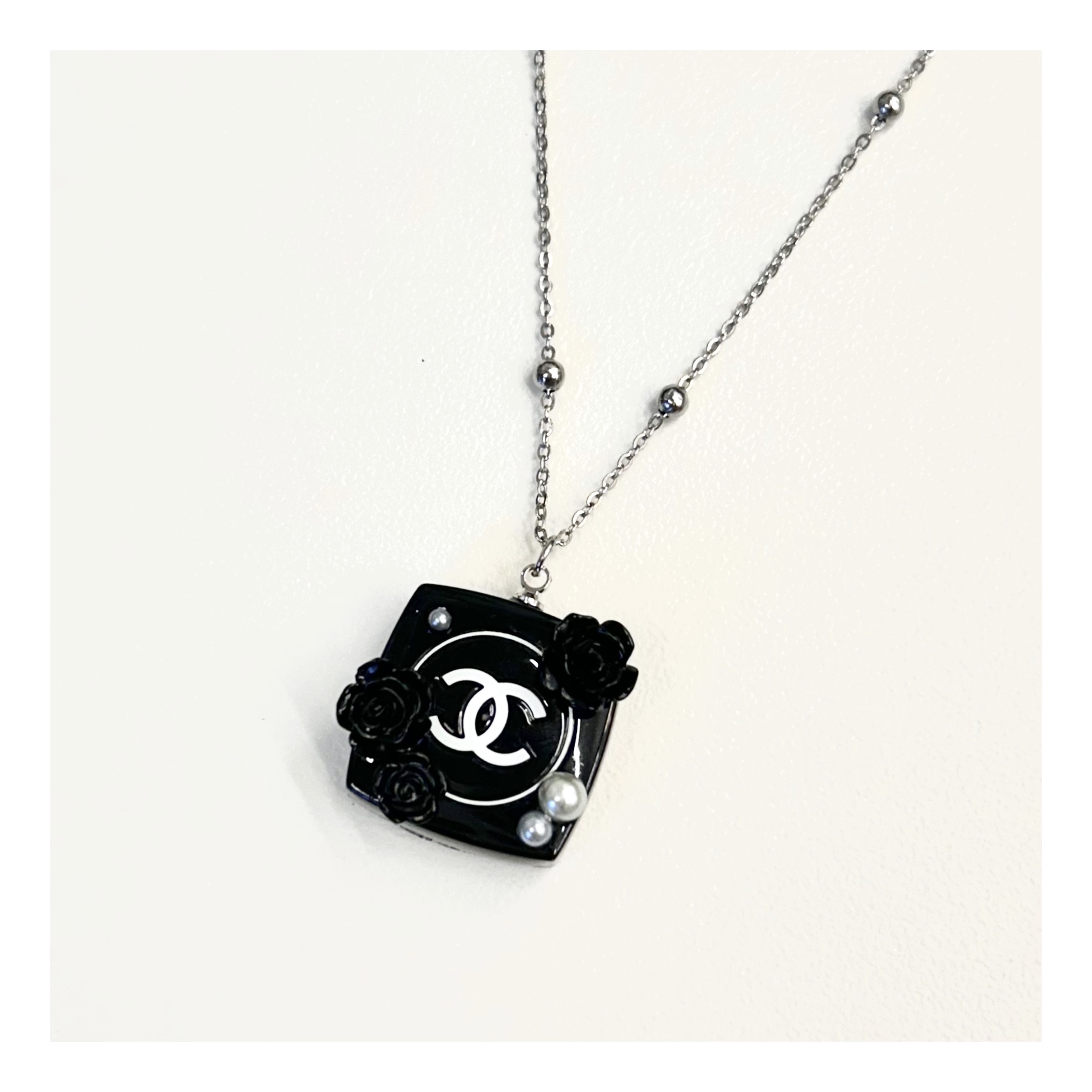CHANEL camellia cosmetic pendant necklace