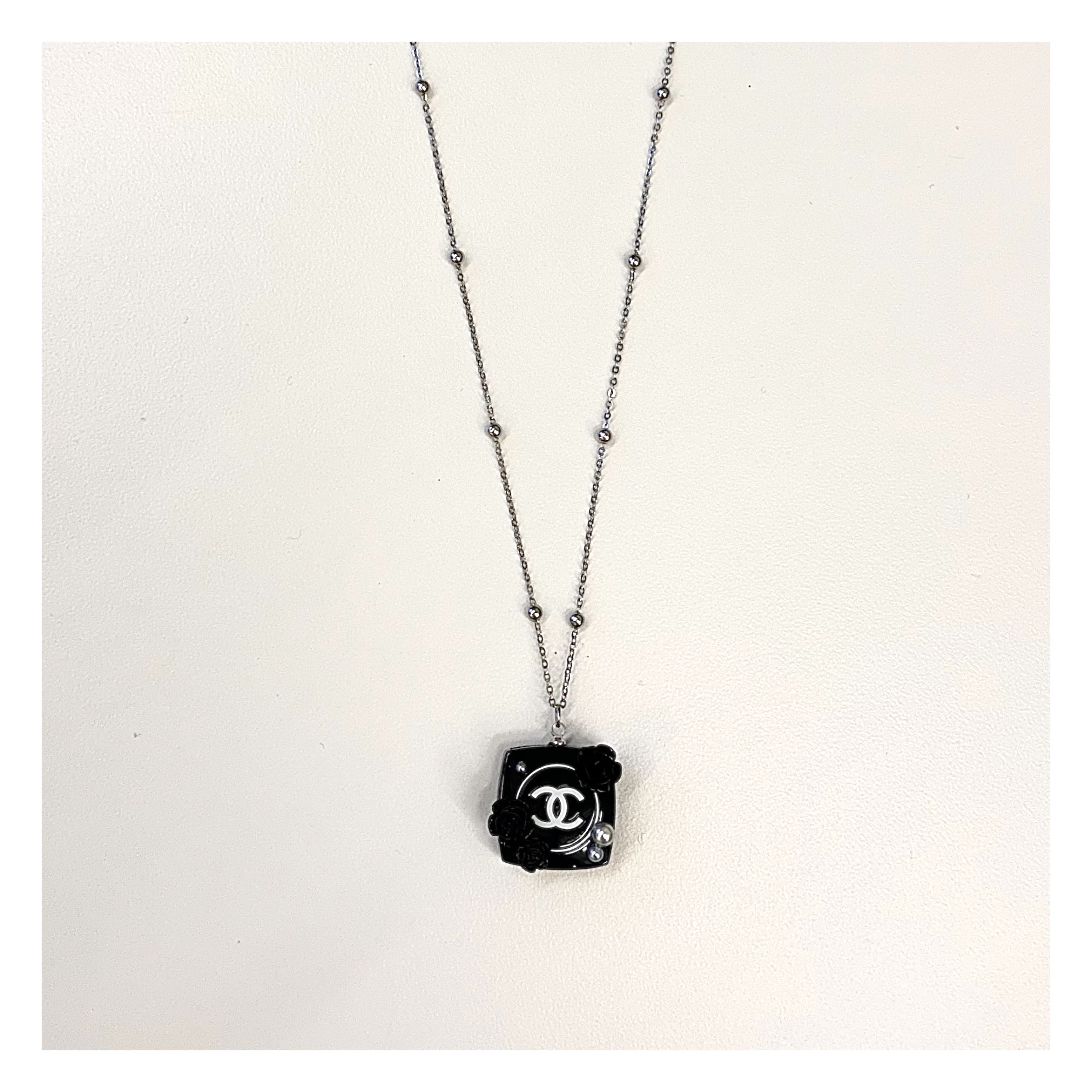 CHANEL camellia cosmetic pendant necklace
