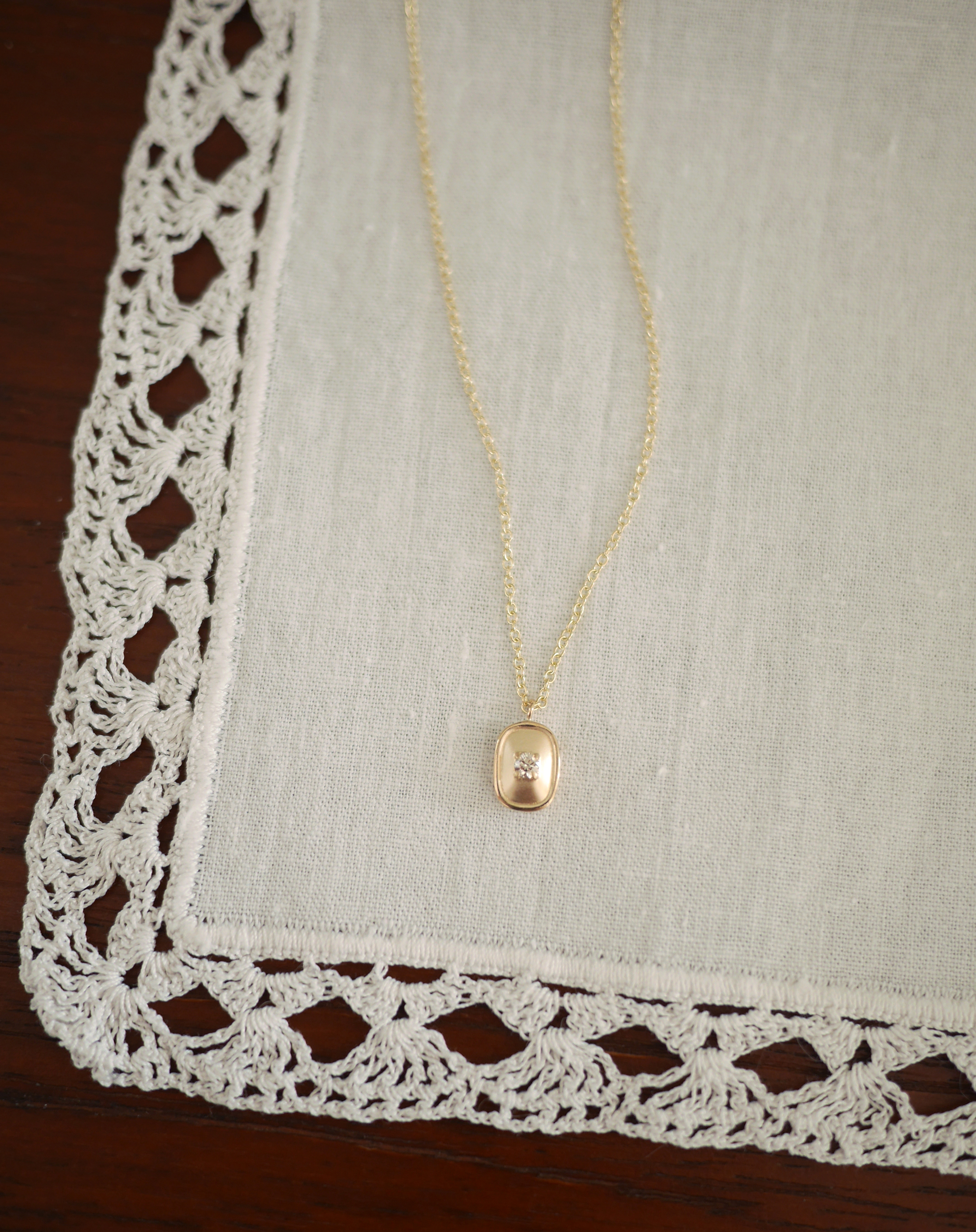 golden pebble diamond necklace