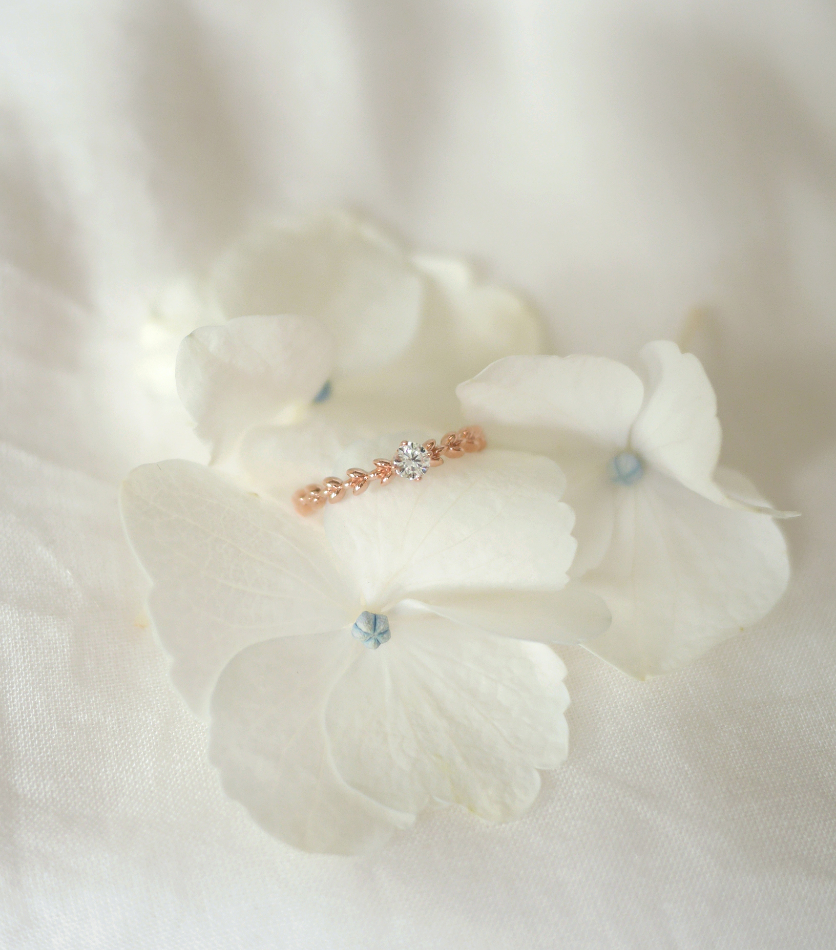 0.1ct diamond flower bud ring
