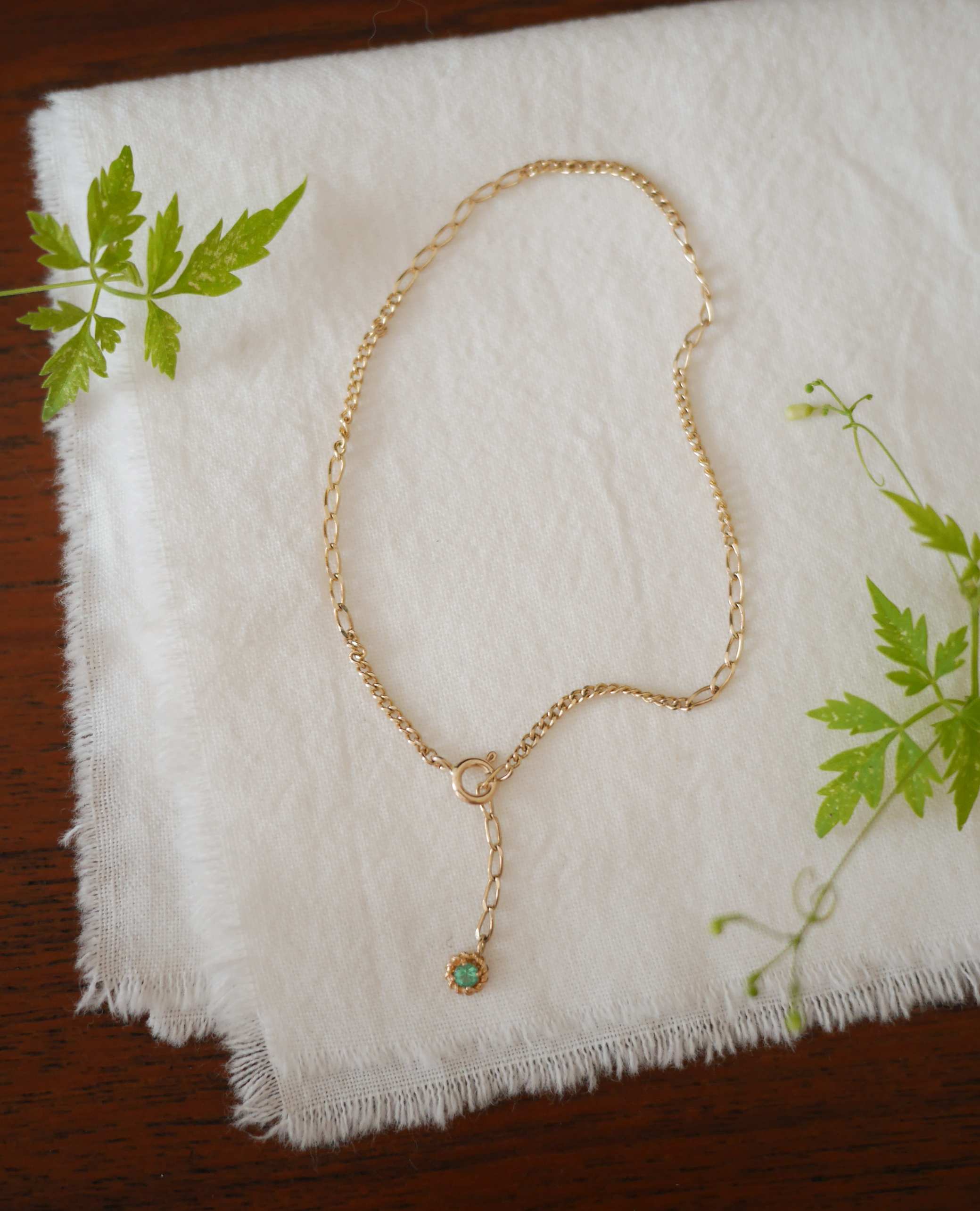 flat chain bracelet with emerald