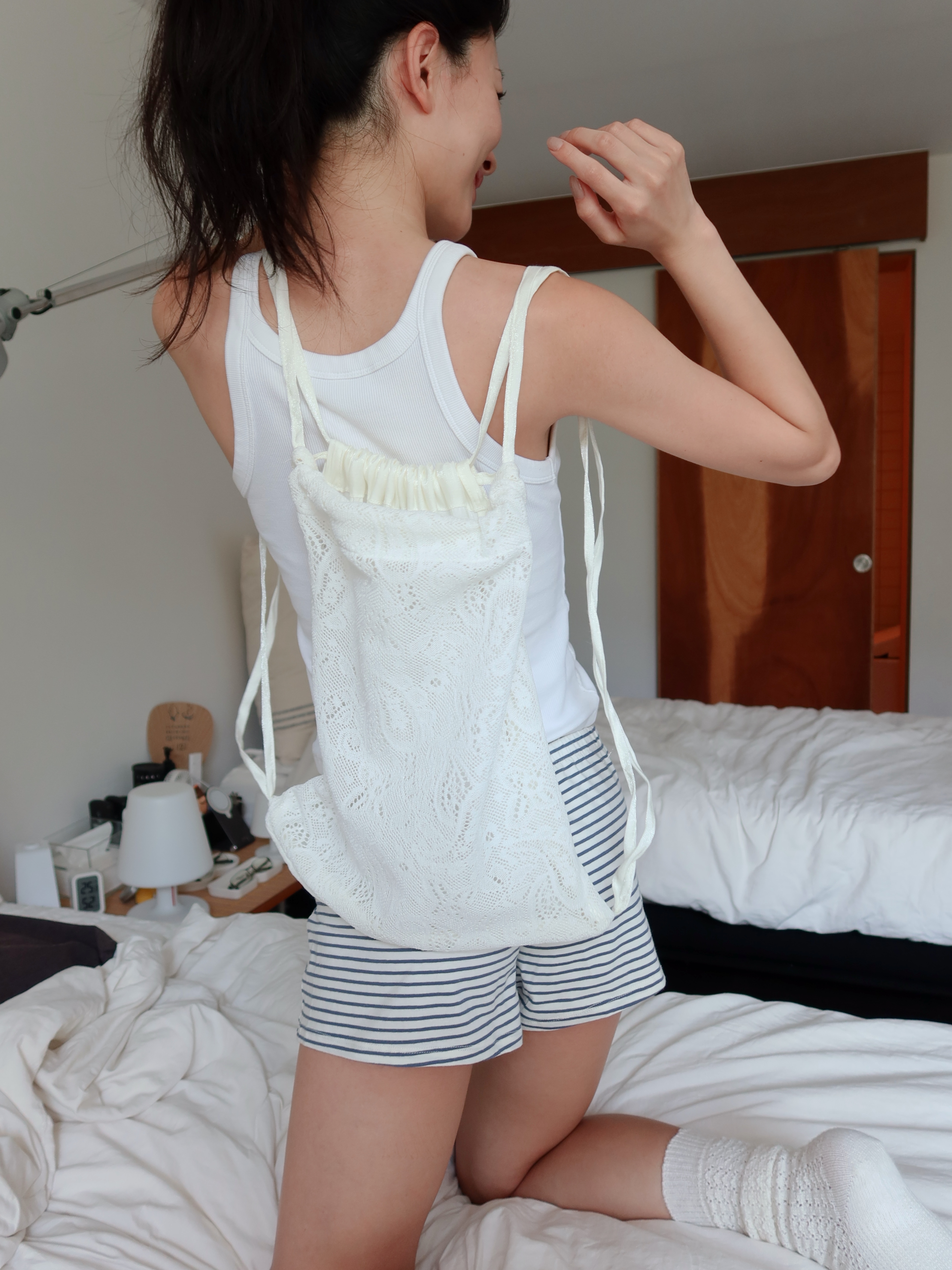 Paisley lace string bag