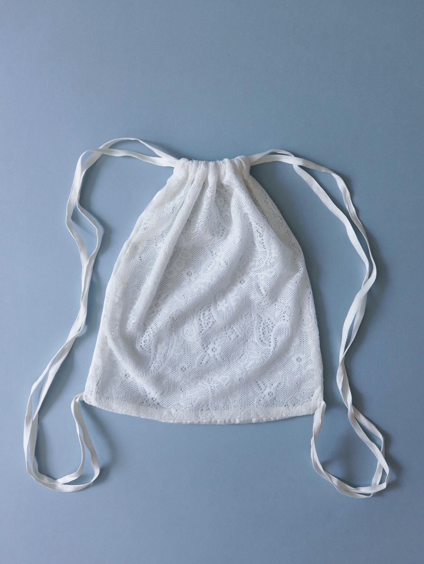 Paisley lace string bag