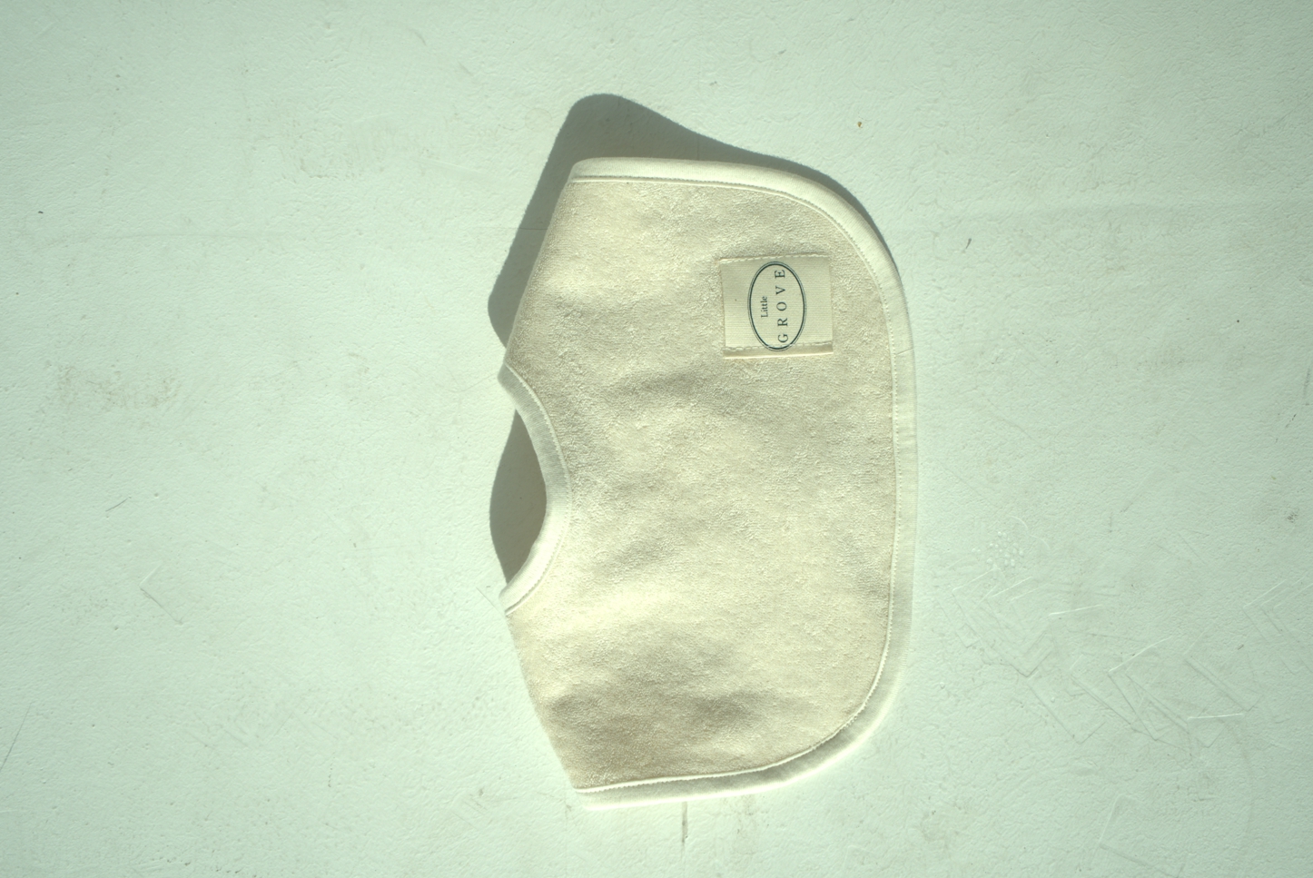 Organic round bib - cream