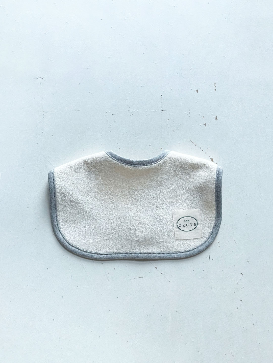 Popped color round bib