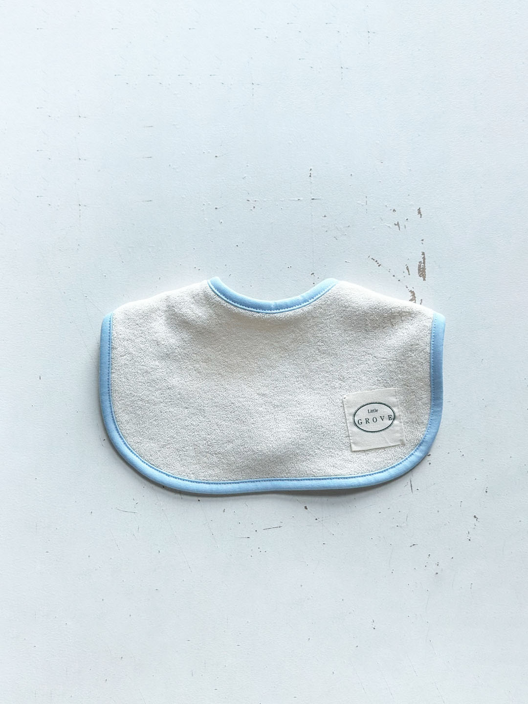 Popped color round bib